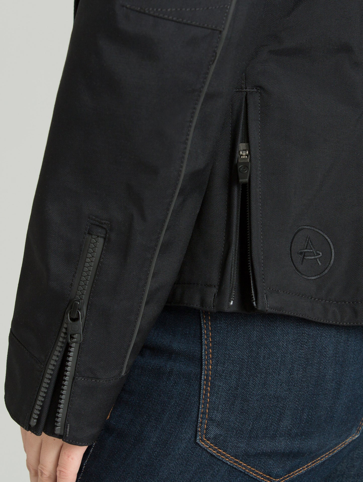 Detail view of black Chase Motorcycle jacket from AETHER Apparel