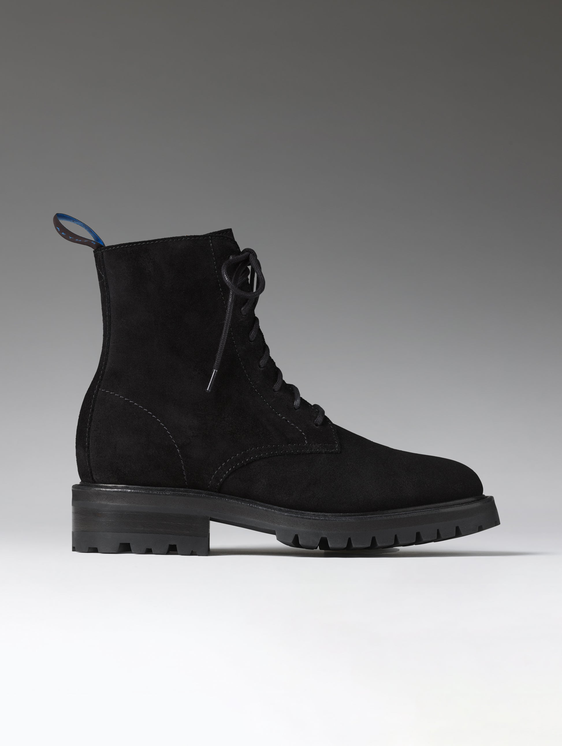 Side profile view of the Crosby Boot in Onyx Black from AETHER Apparel.