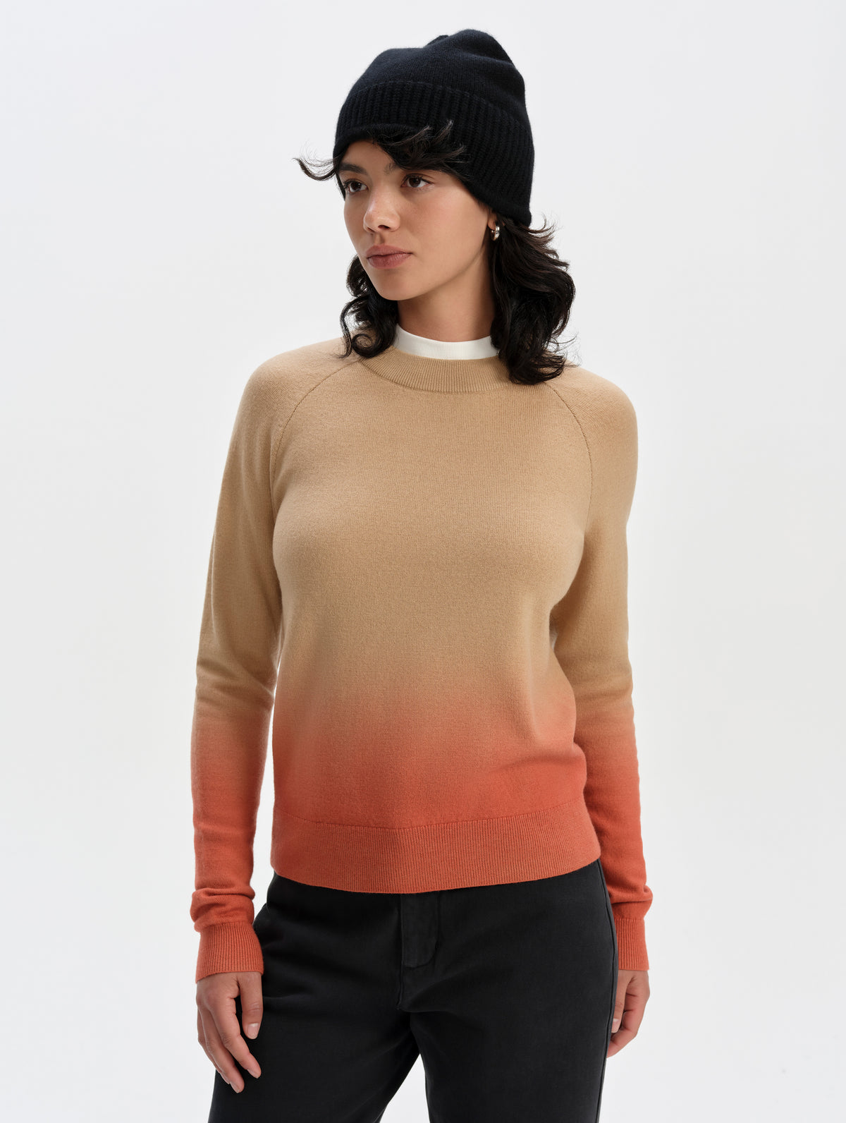 Front upper-body view of woman wearing the Dash Ombre Sweater in Latte Brown from AETHER Apparel.