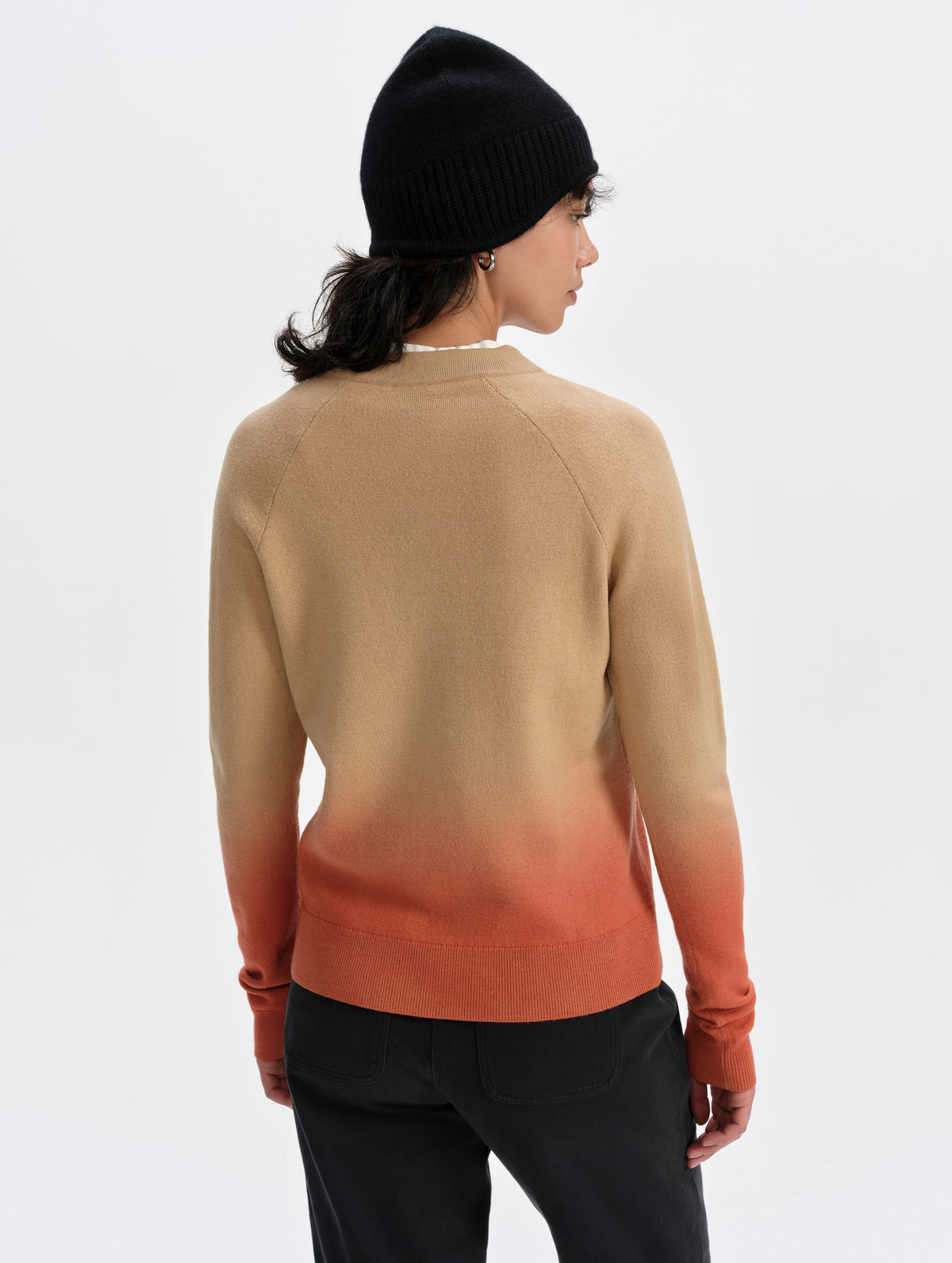 Rear upper-body view of woman wearing the Dash Ombre Sweater in Latte Brown from AETHER Apparel.