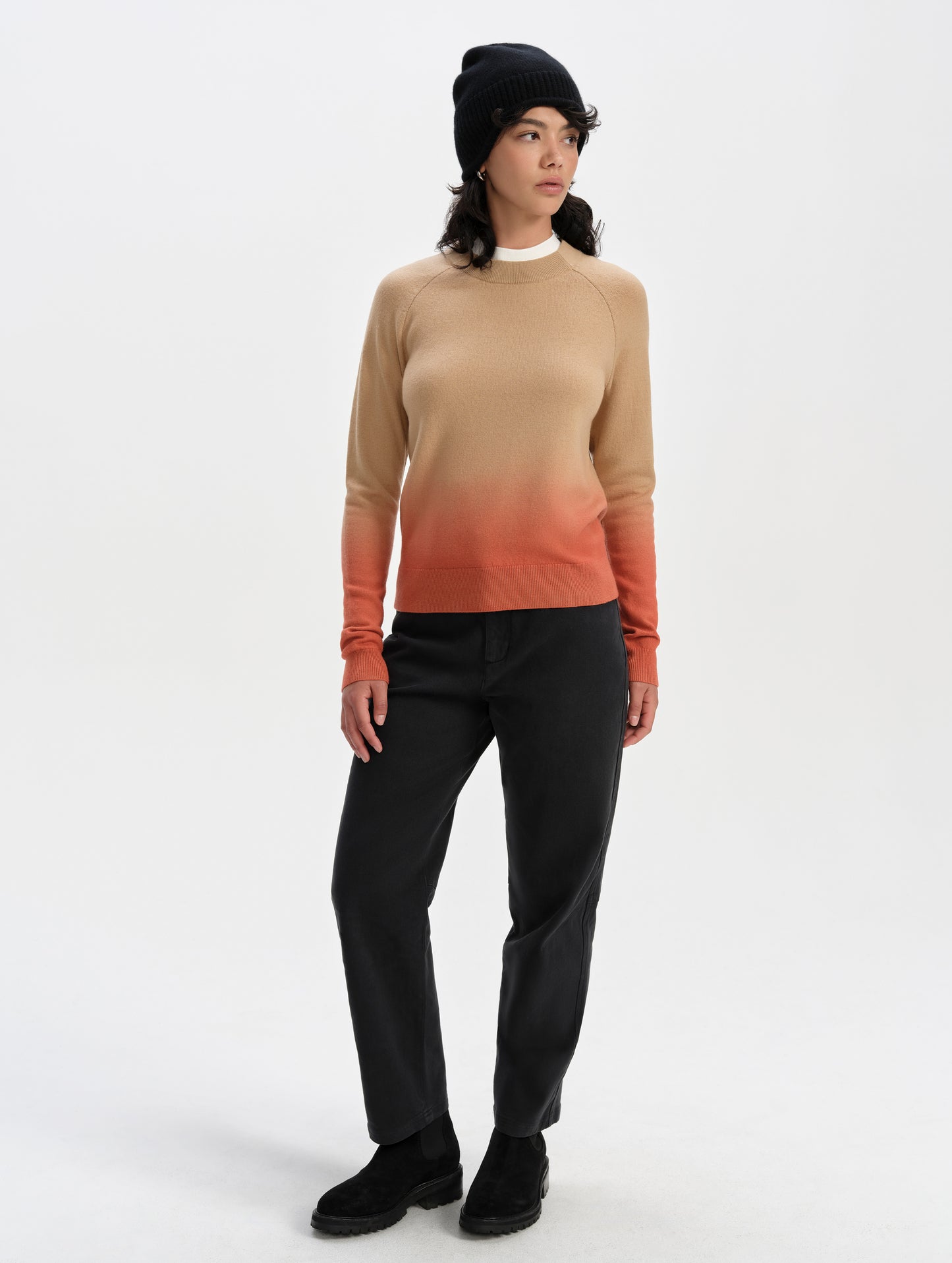Front full-body view of woman wearing the Dash Ombre Sweater in Latte Brown from AETHER Apparel.