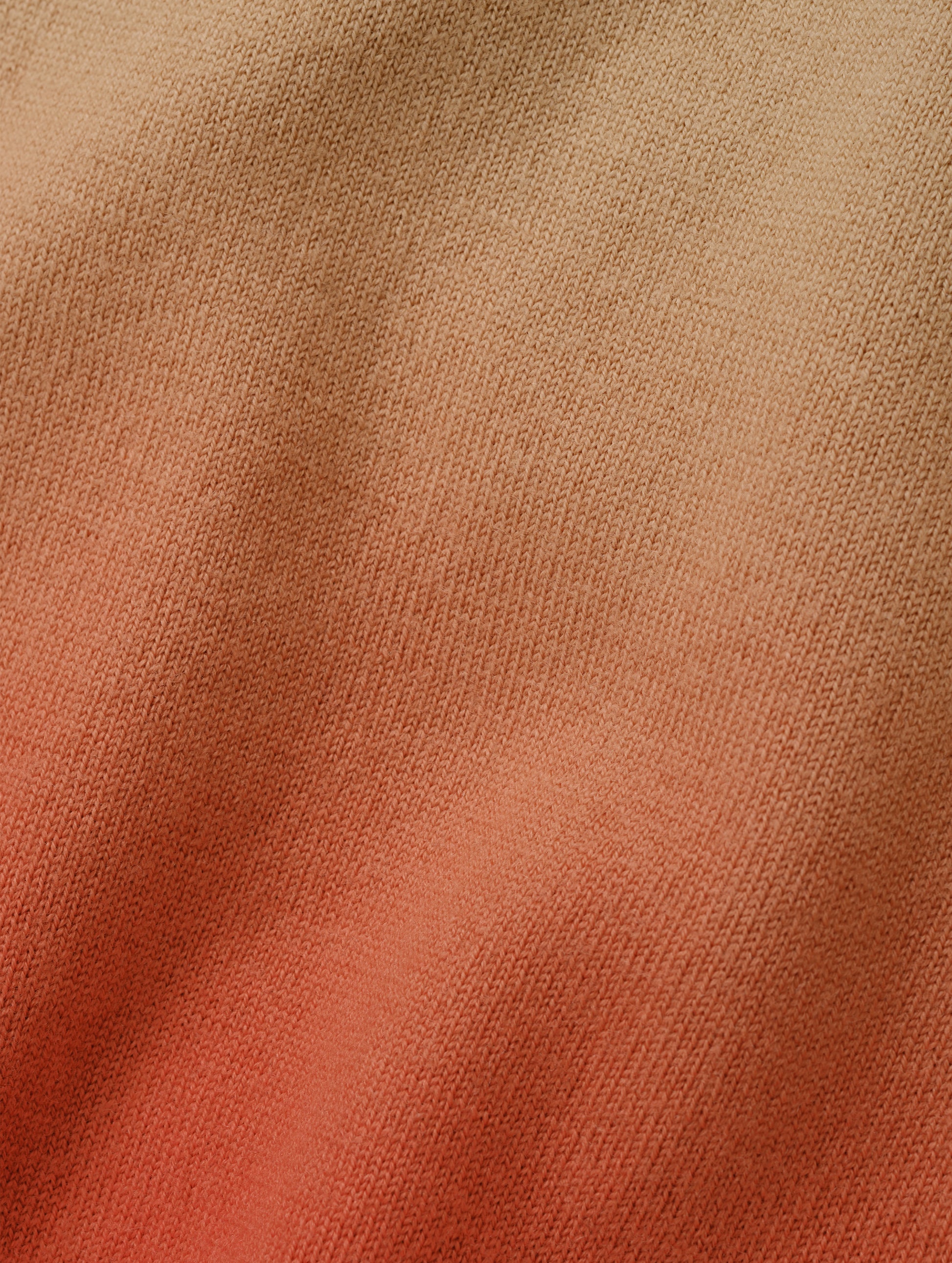 Closeup detailed view of the two-tone dip-dyed colorway on the Dash Ombre Sweater in Latte Brown from AETHER Apparel.