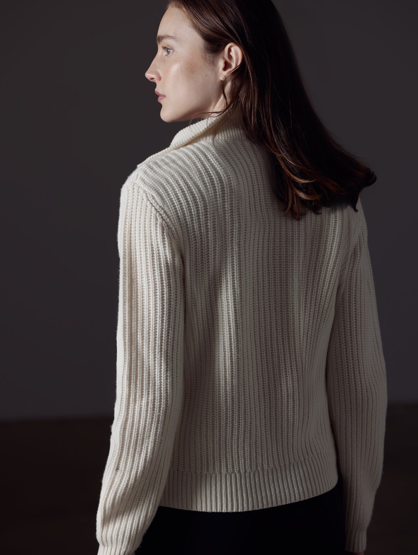 Back view of woman wearing white Davis Half-Zip Sweater