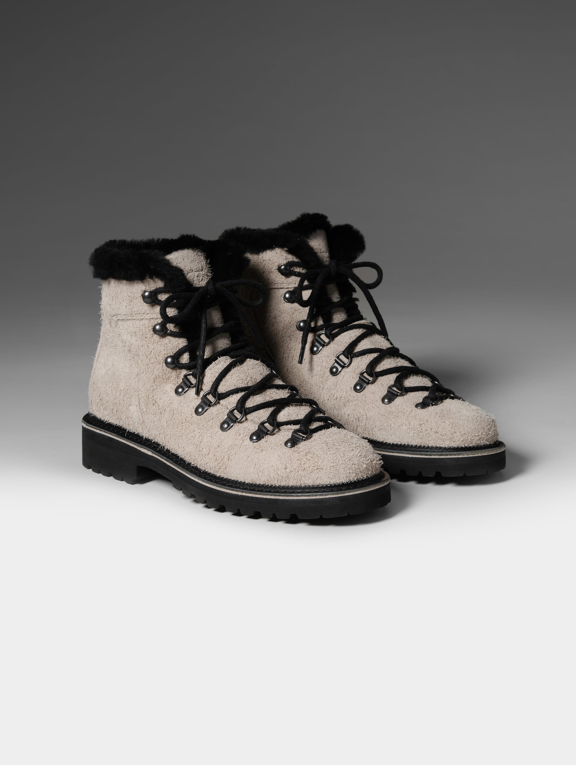 Front 3/4 studio shot of the W Dolomite Boot w/ Shearling in Sandstone with black laces from AETHER Apparel.