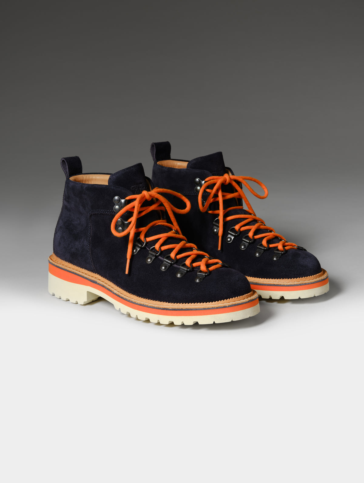 Front 3/4 studio shot of the W Dolomite Boot in Total Eclipse with orange laces from AETHER Apparel.