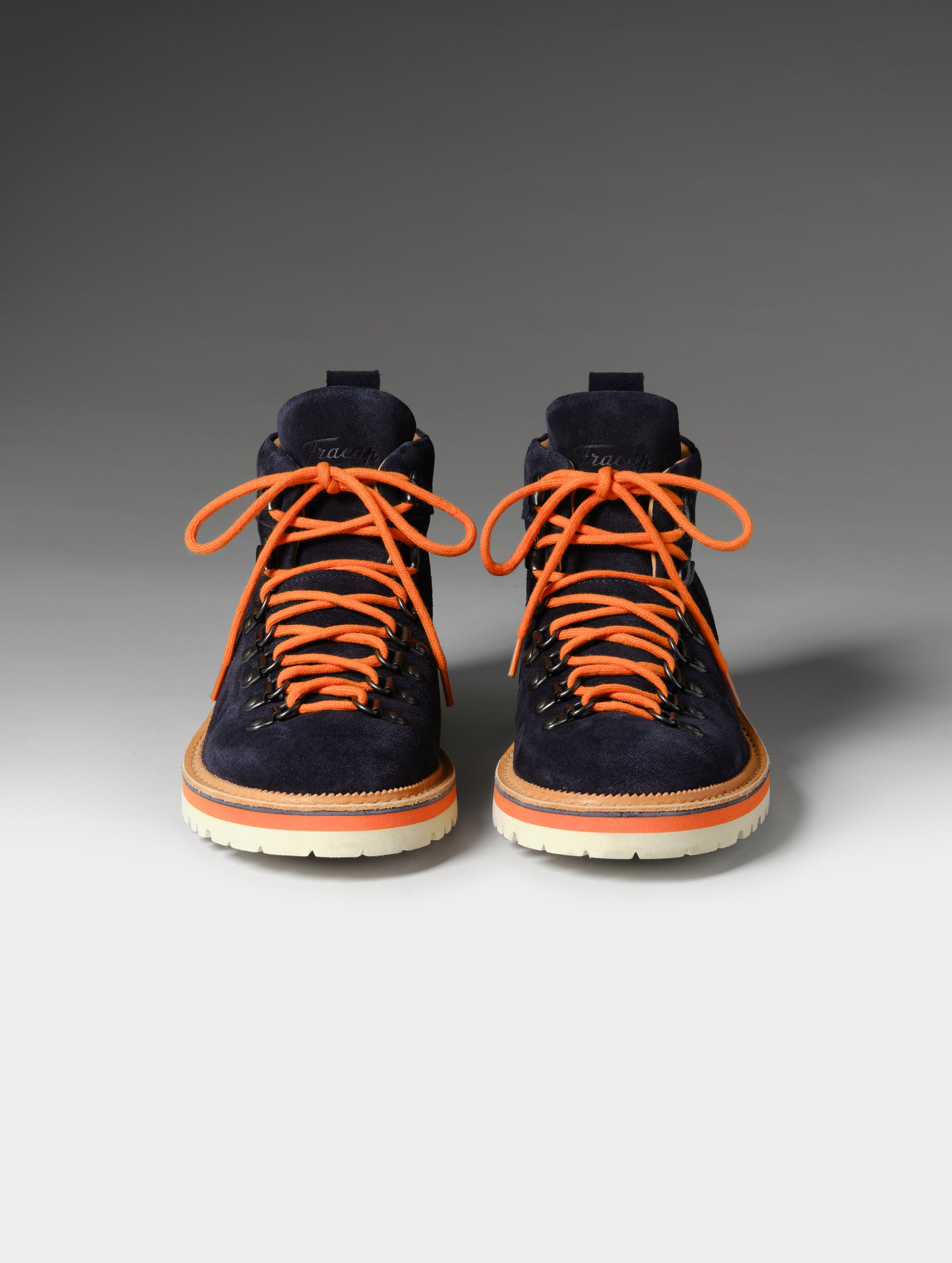 Front studio shot of the W Dolomite Boot in Total Eclipse with orange laces from AETHER Apparel.