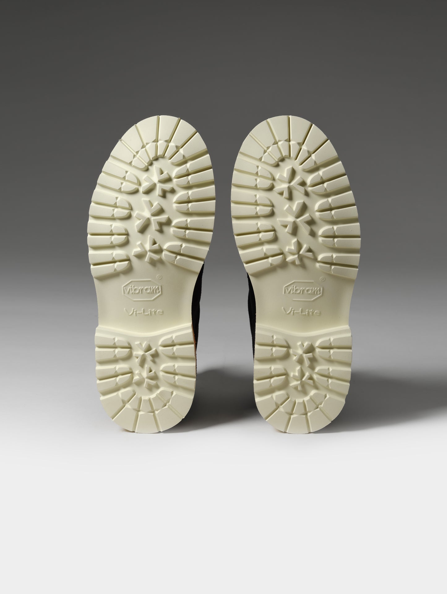 Studio shot of the Vibram outsoles on the W Dolomite Boot in Total Eclipse from AETHER Apparel.
