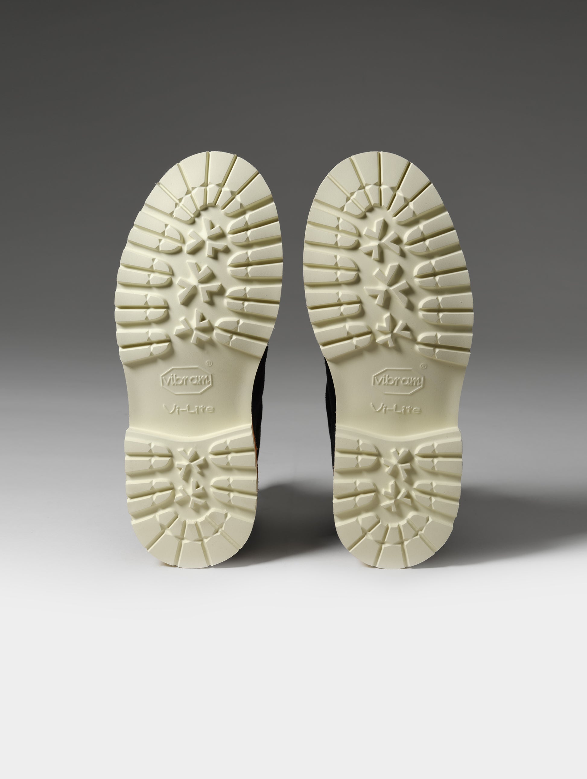 Studio shot of the Vibram outsoles on the W Dolomite Boot in Total Eclipse from AETHER Apparel.