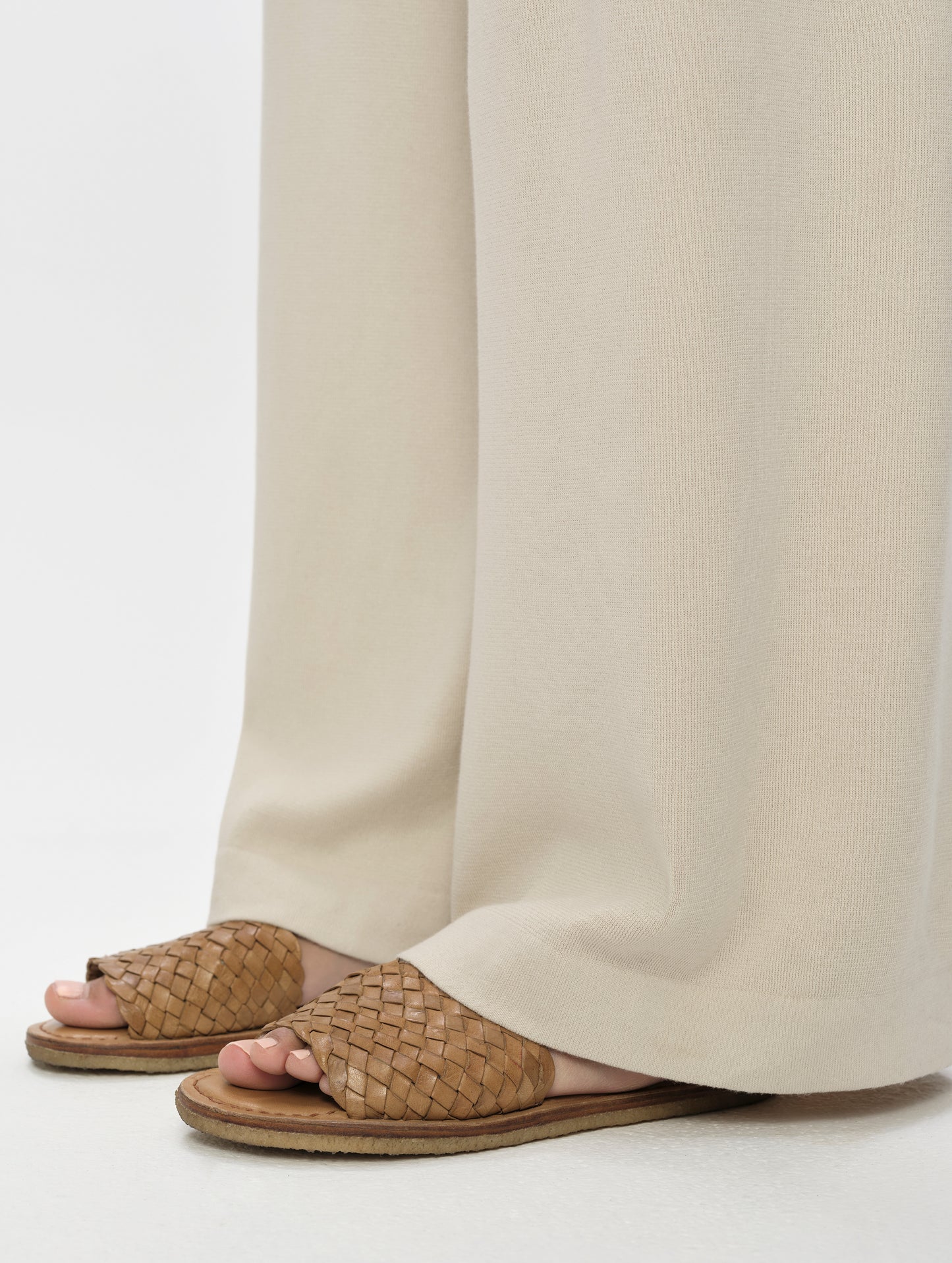 Closeup detailed view if the lug cuffs on the Eliana Sweater Pant in Bone from AETHER Apparel.