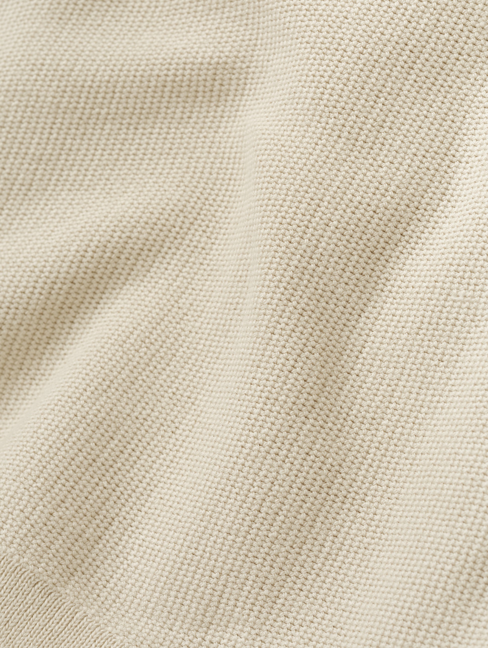 Closeup detailed view of the fabric on the Eliana Sweater Tee in Bone from AETHER Apparel.