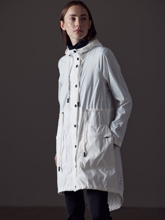 woman wearing white jacket from AETHER Apparel