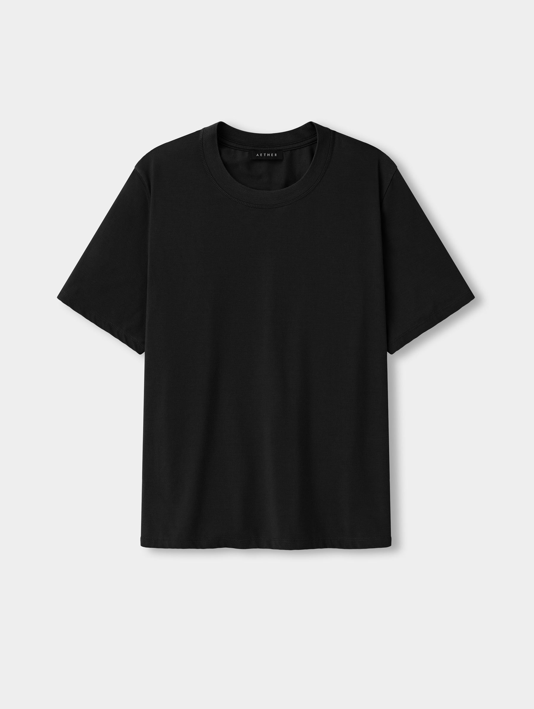 Flat lay view of the Hana Short-Sleeve Tee Shirt in Onyx Black from AETHER Apparel.