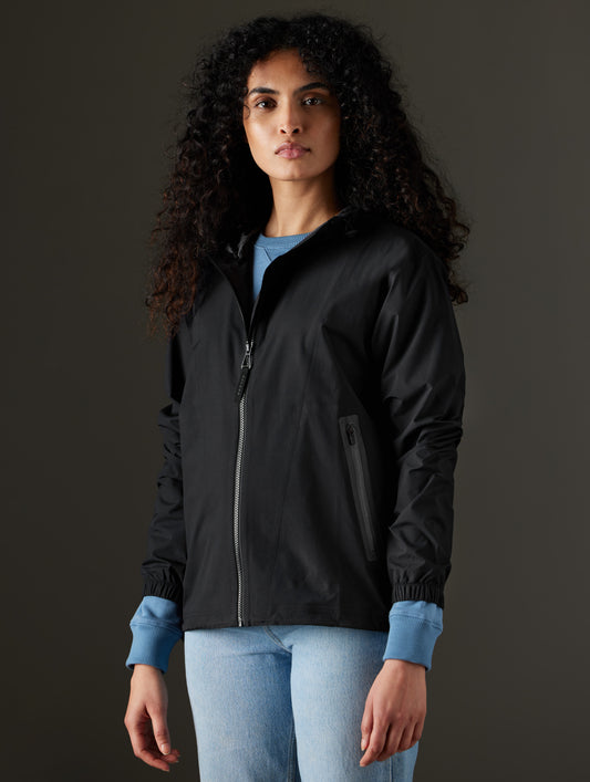 Woman wearing black jacket from AETHER Apparel