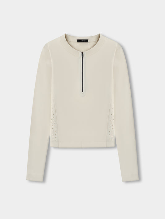 Flat lay view of the Kora Sunproof Shirt in Bone from AETHER.