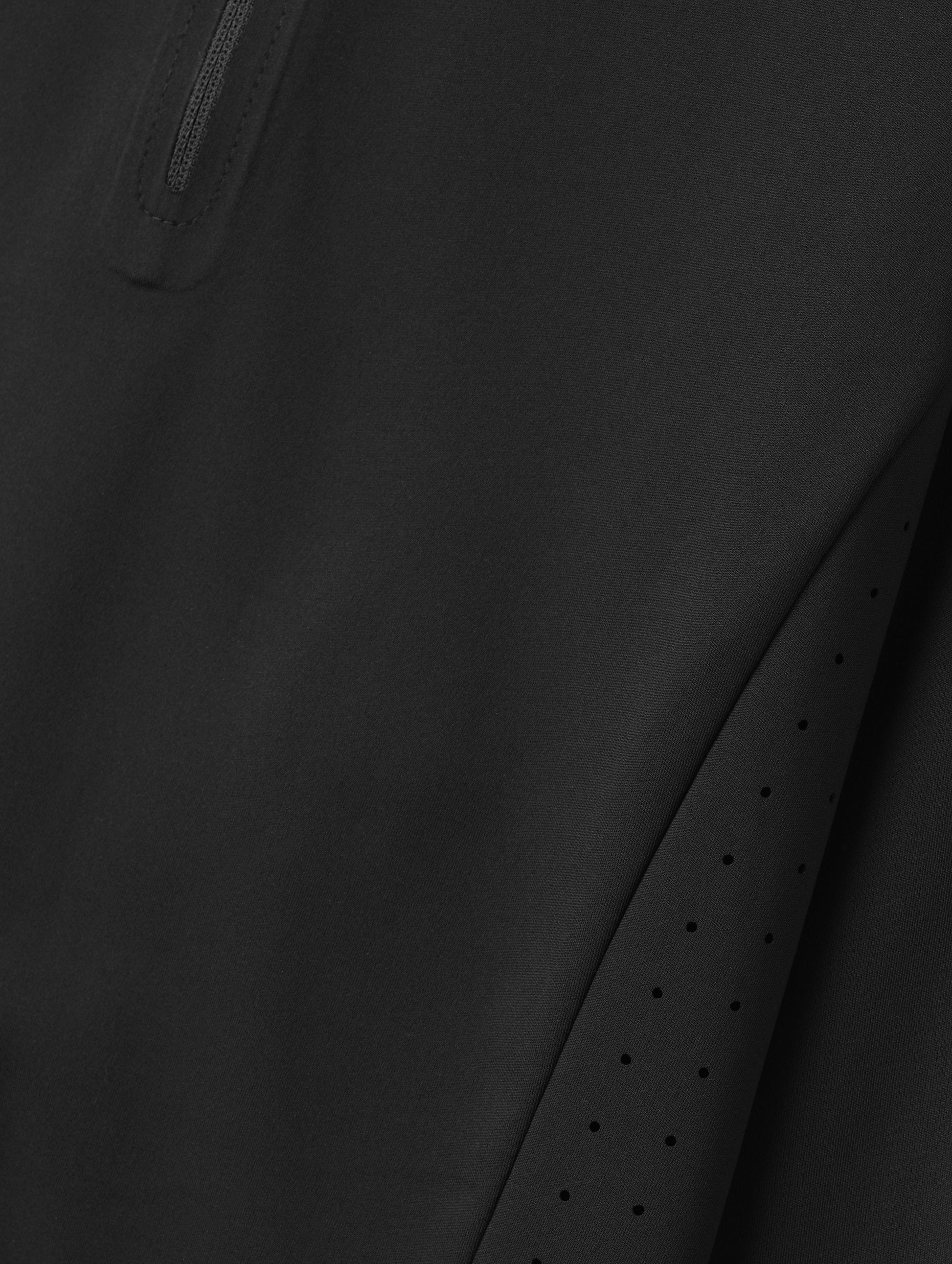 Closeup detailed view of the fabric on the Kora Sunproof Shirt in Onyx Black from AETHER Apparel.