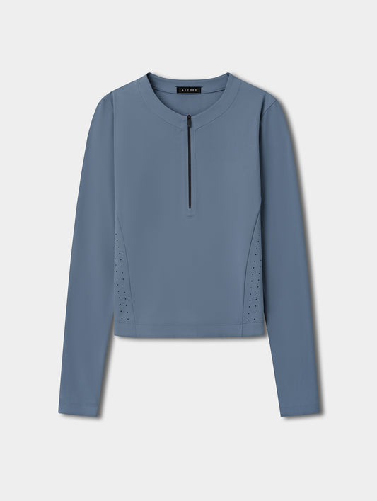 Flat lay view of the Kora Sunproof Shirt in Portal Blue from AETHER.