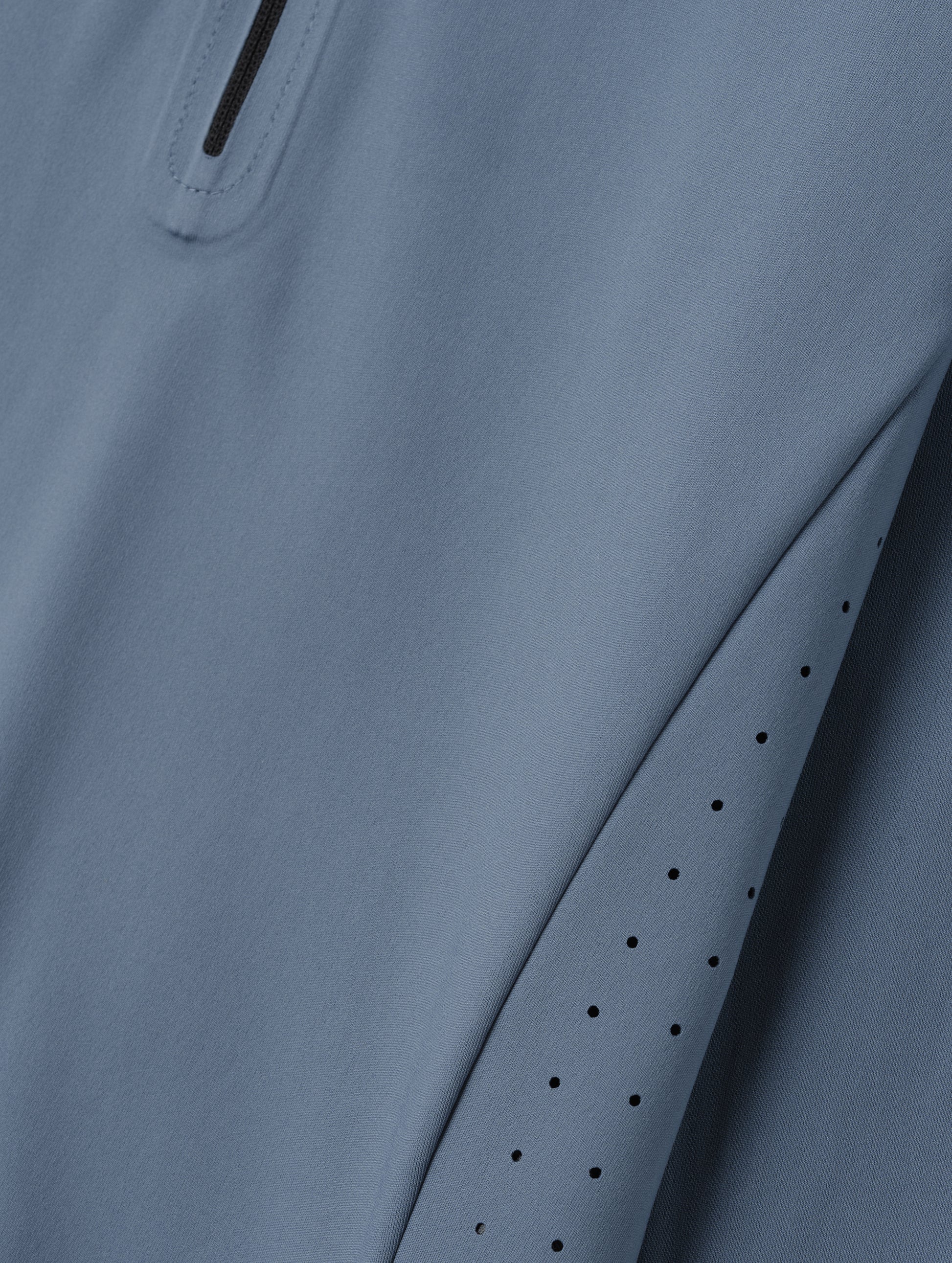 Closeup detailed view of the fabric on the Kora Sunproof Shirt in Portal Blue from AETHER Apparel.
