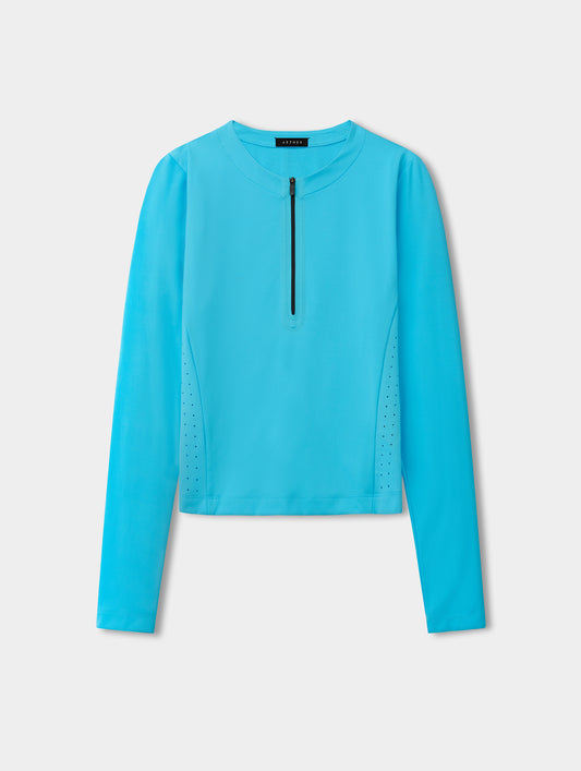 Flat lay view of the Kora Sunproof Shirt in Sky Blue from AETHER.