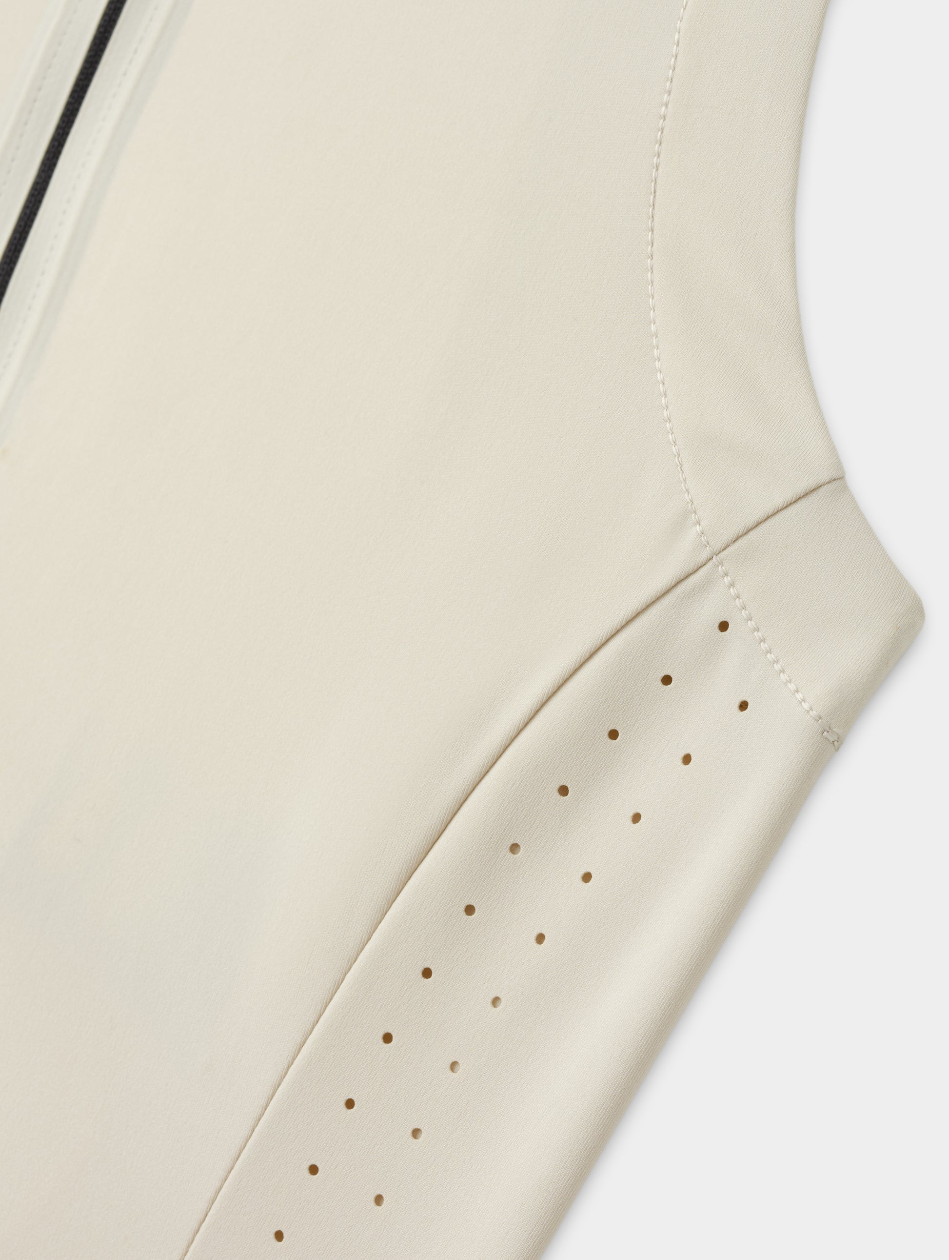 Flat lay view of the laser-cut side panel ventilation on the Kora Sunproof Tank Top in Bone from AETHER Apparel.