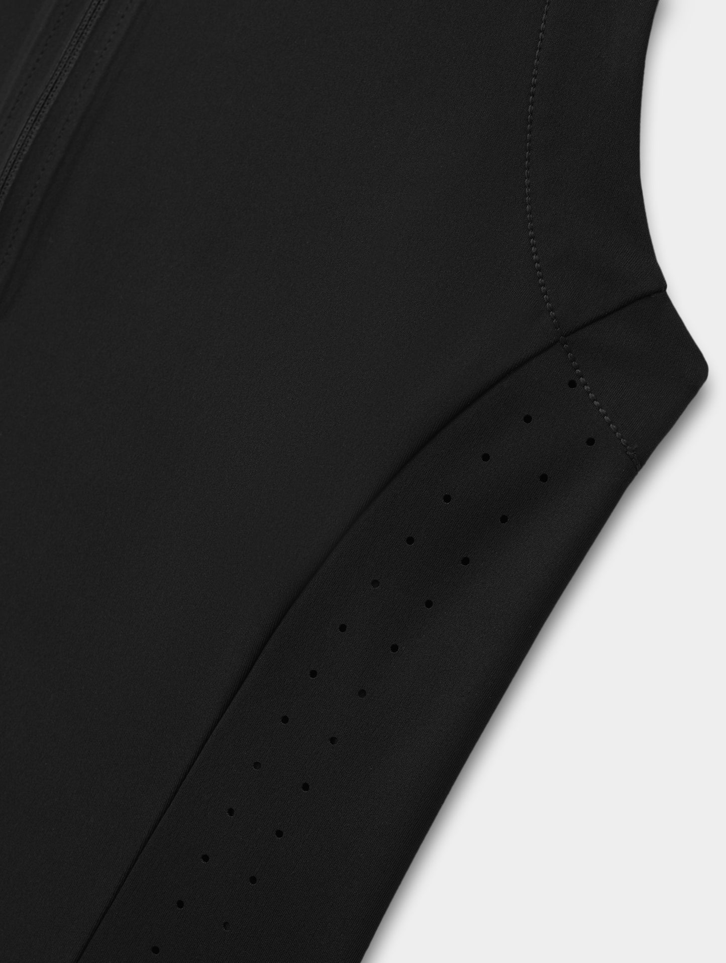 Flat lay view of the laser-cut side panel ventilation on the Kora Sunproof Tank Top in Onyx Black from AETHER Apparel.