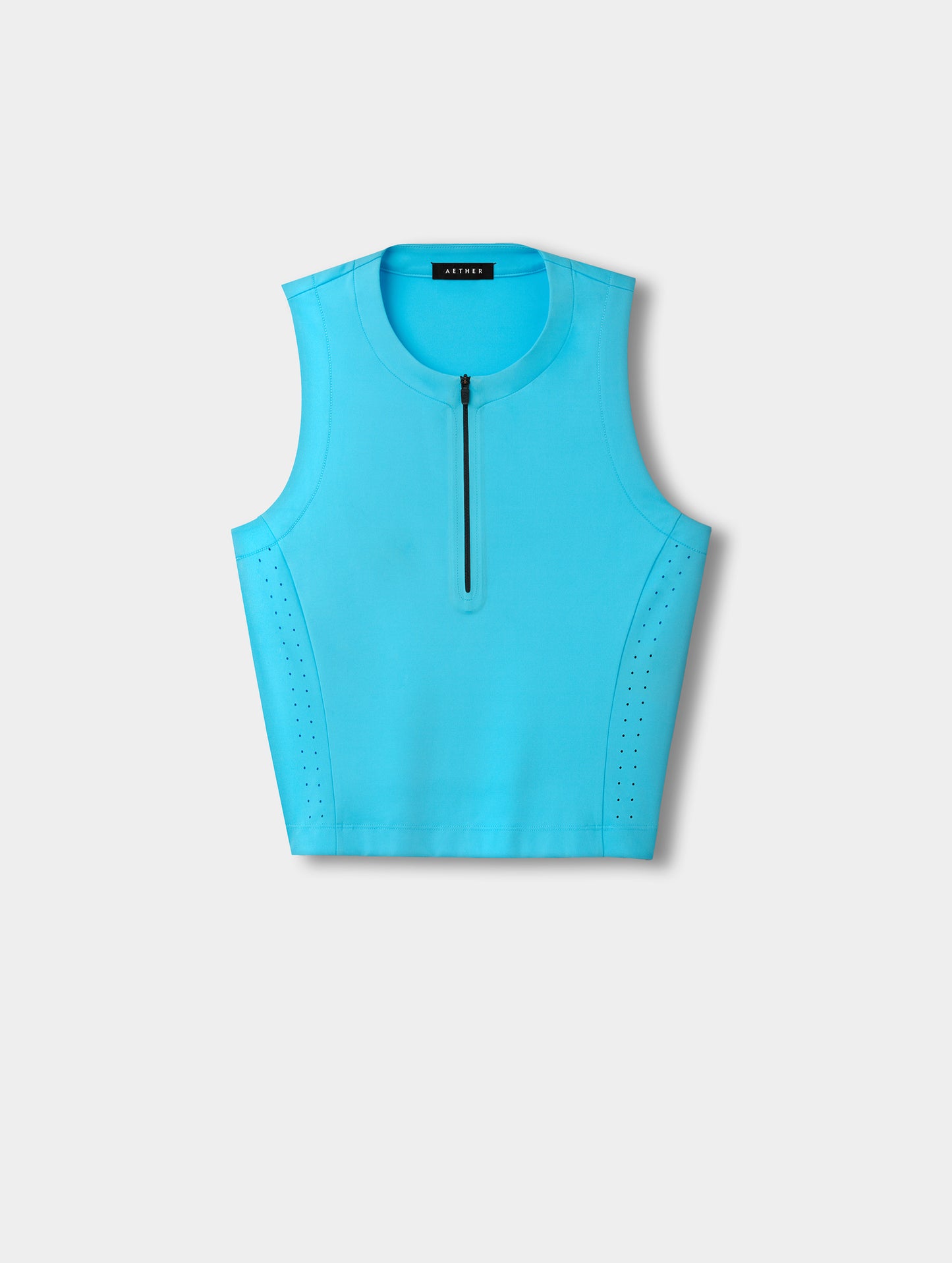 Flat lay view of the Kora Sunproof Tank Top in Sky Blue from AETHER.