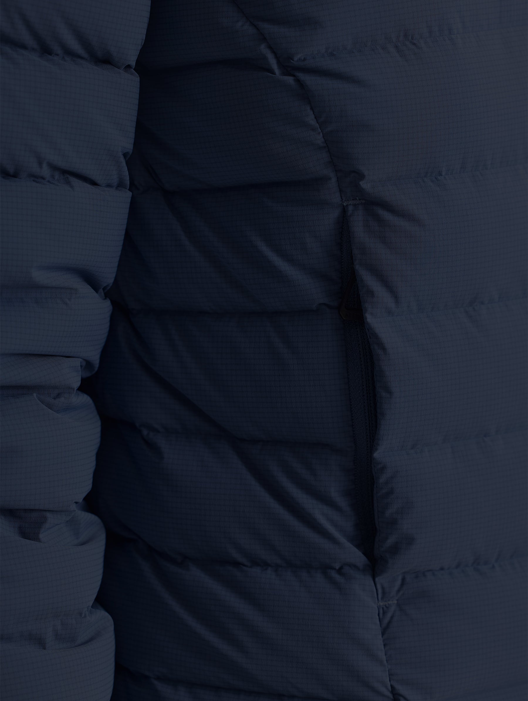 Closeup detail view of wearer's right pocket of W Launch Full-Zip Jacket NH in Onyx Black from AETHER Apparel.