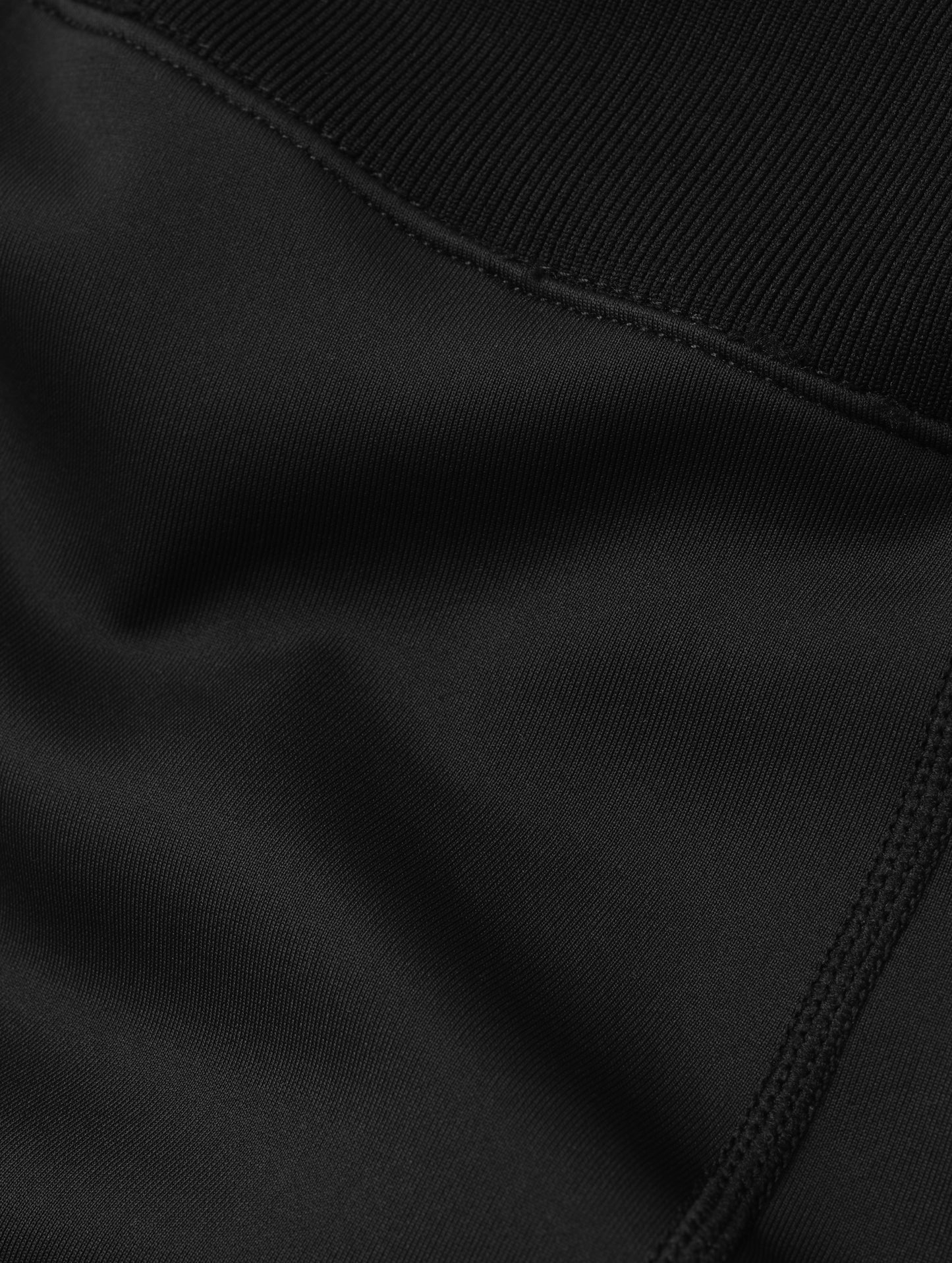 Closeup detailed look at the fabric of the Laurel Legging in Onyx Black from AETHER Apparel.