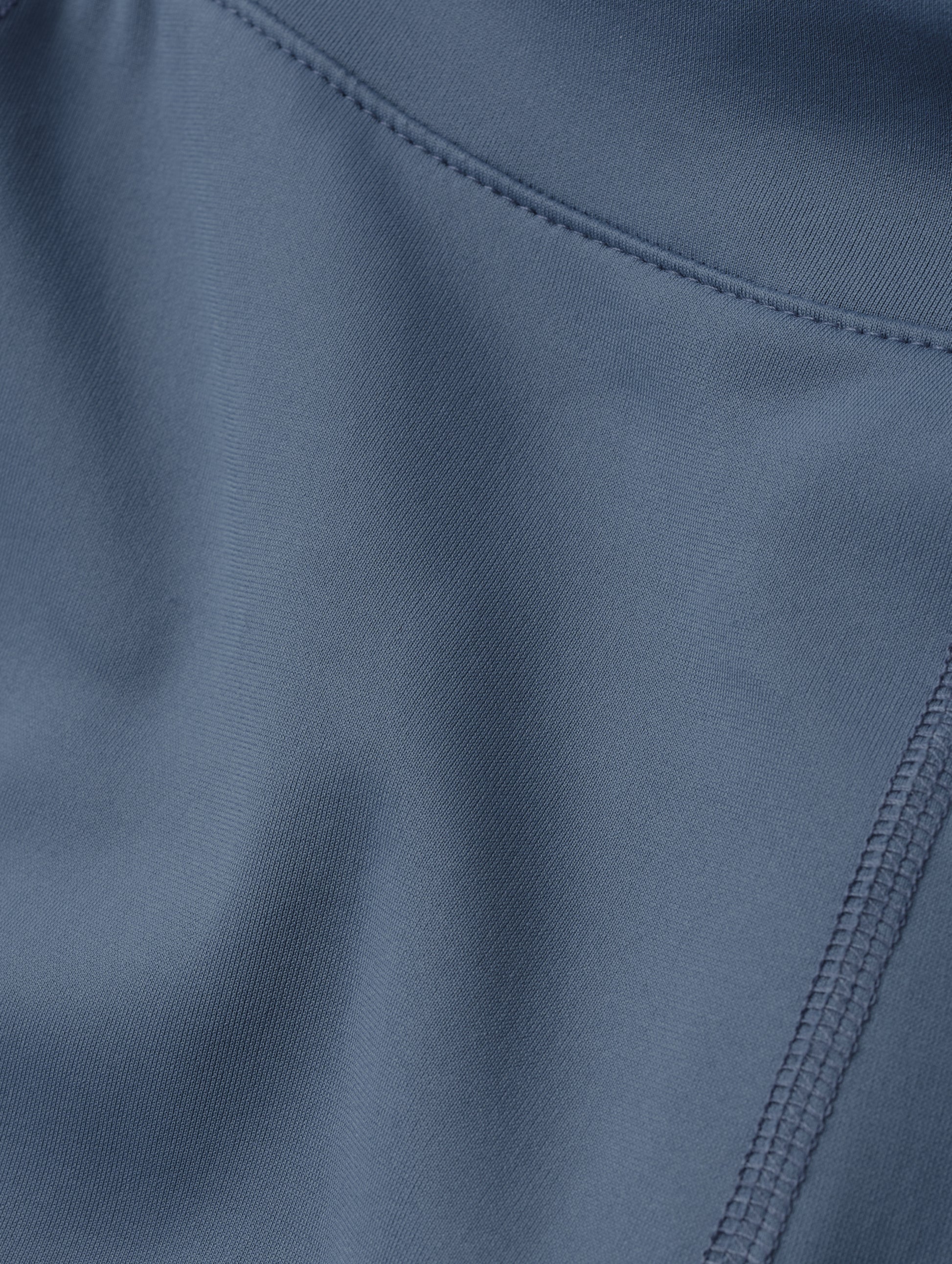 Closeup detailed view of the fabric on the Laurel Legging in Portal Blue from AETHER Apparel.