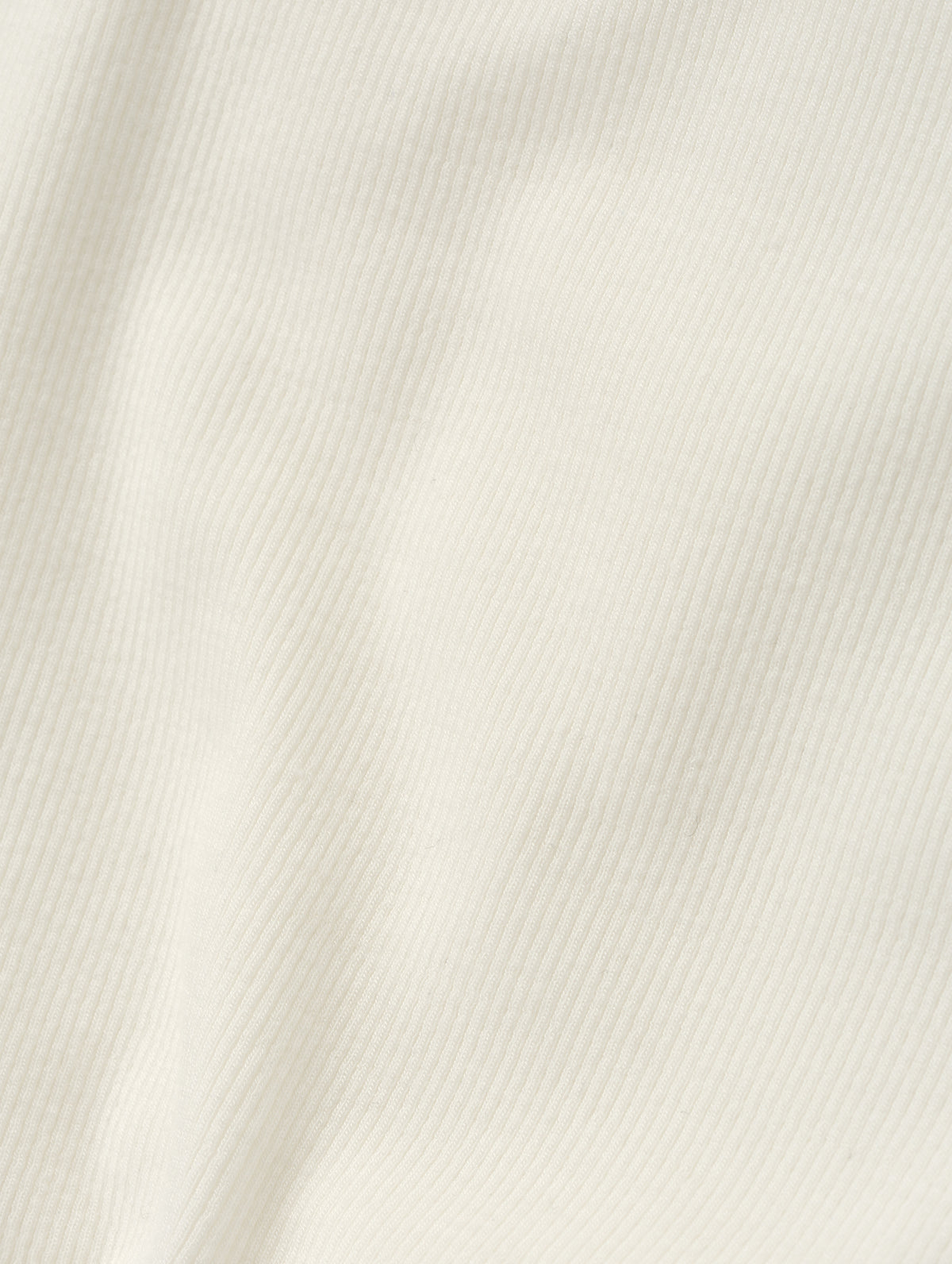 Closeup detailed view of the rib-knit fabric on the Legacy Long-Sleeve Henley in Winter White from AETHER Apparel.