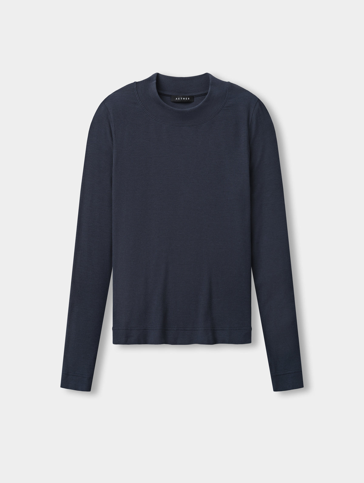 Flat lay view of the Legacy Long-Sleeve Shirt in Total Eclipse from AETHER Apparel.