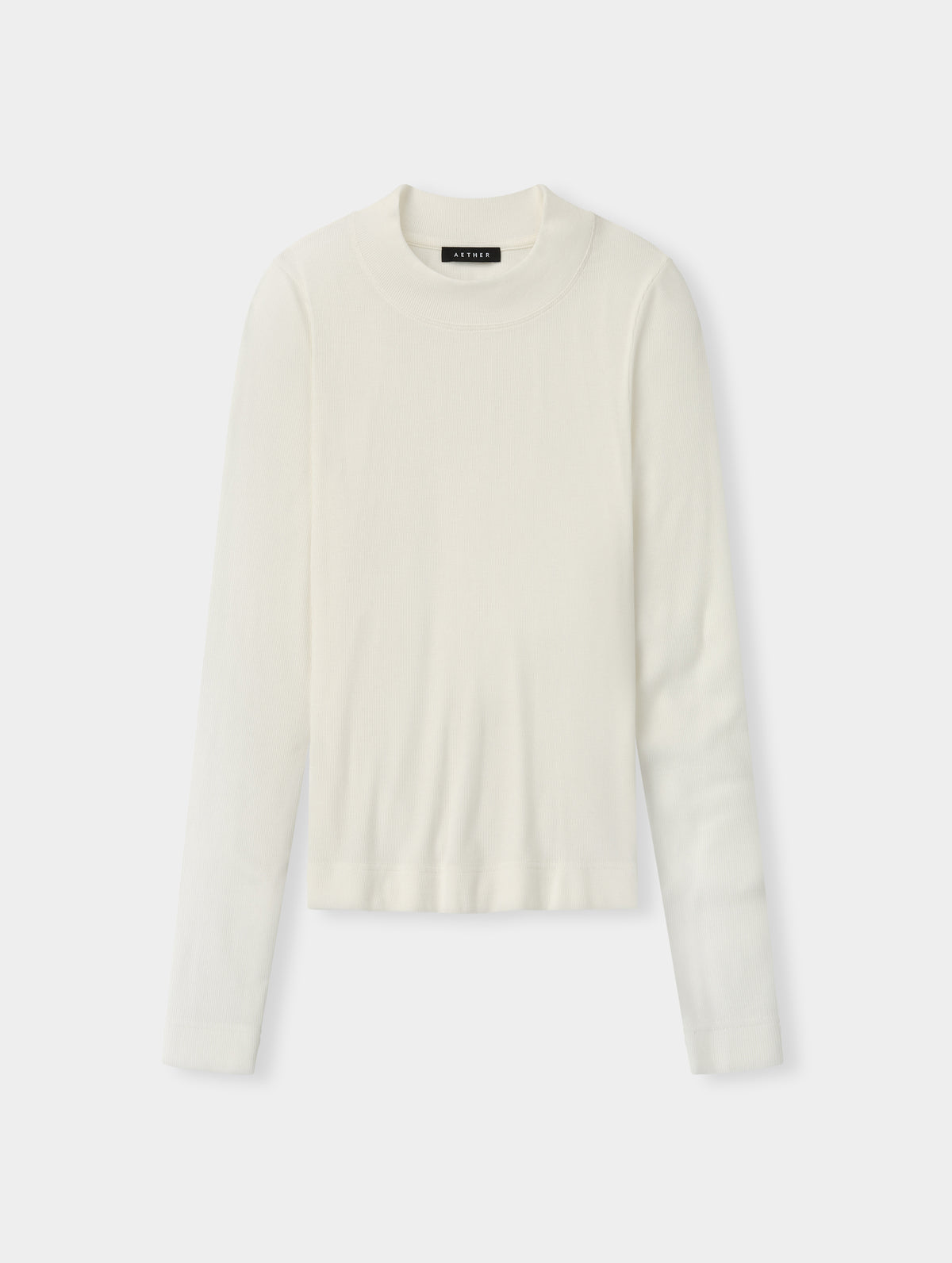 Flat lay view of the Legacy Long-Sleeve Shirt in Winter White from AETHER Apparel.