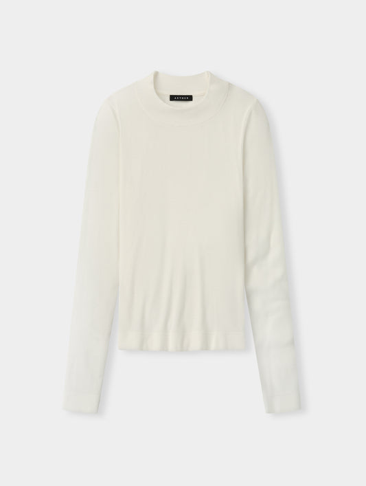 Flat lay view of the Legacy Long-Sleeve Shirt in Winter White from AETHER Apparel.