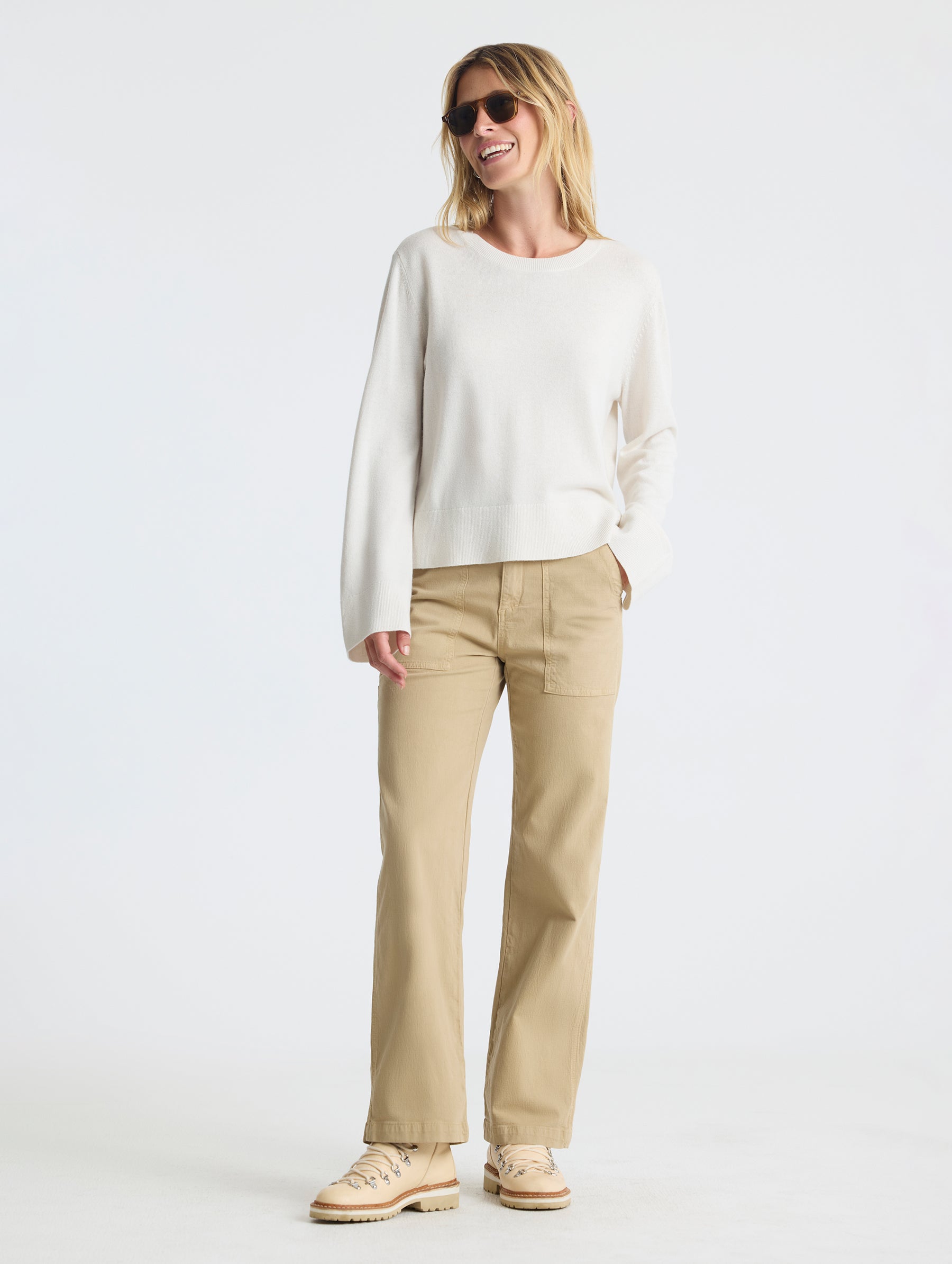Full body view of woman wearing Leigh Cashmere Crewneck in Winter White from AETHER Apparel.