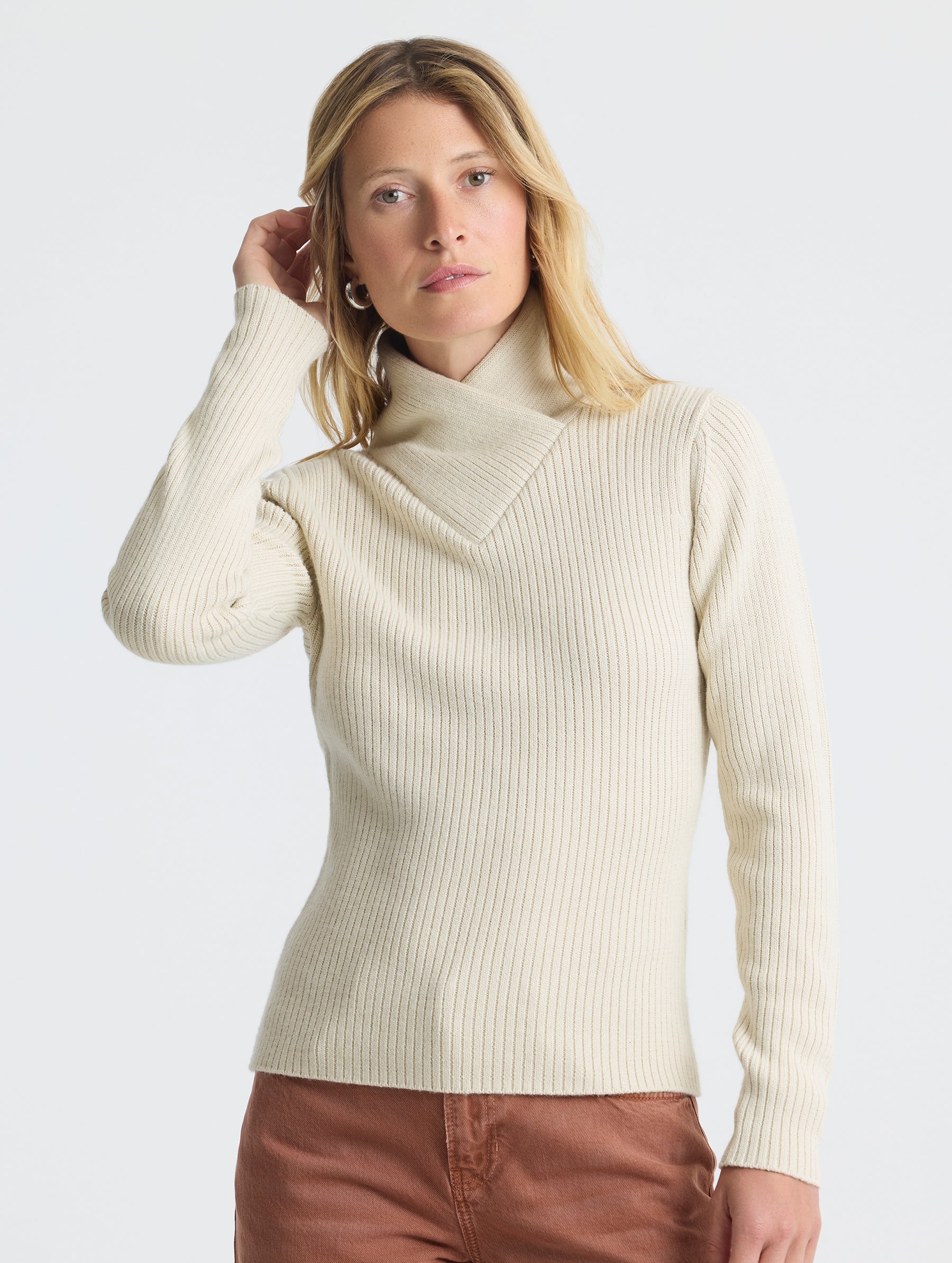 Upper body view of woman wearing Lexington Sweater in Bone white from AETHER Apparel.