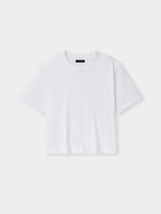 Flat lay view of the Lola Relaxed Tee in White from AETHER Apparel.