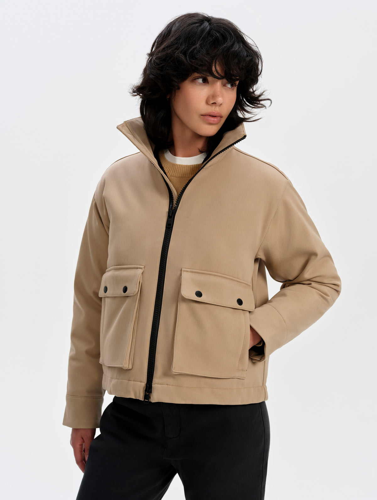 Front upper-body view of woman wearing the Luna 3-in-1 Field Jacket in Latte Brown from AETHER Apparel.