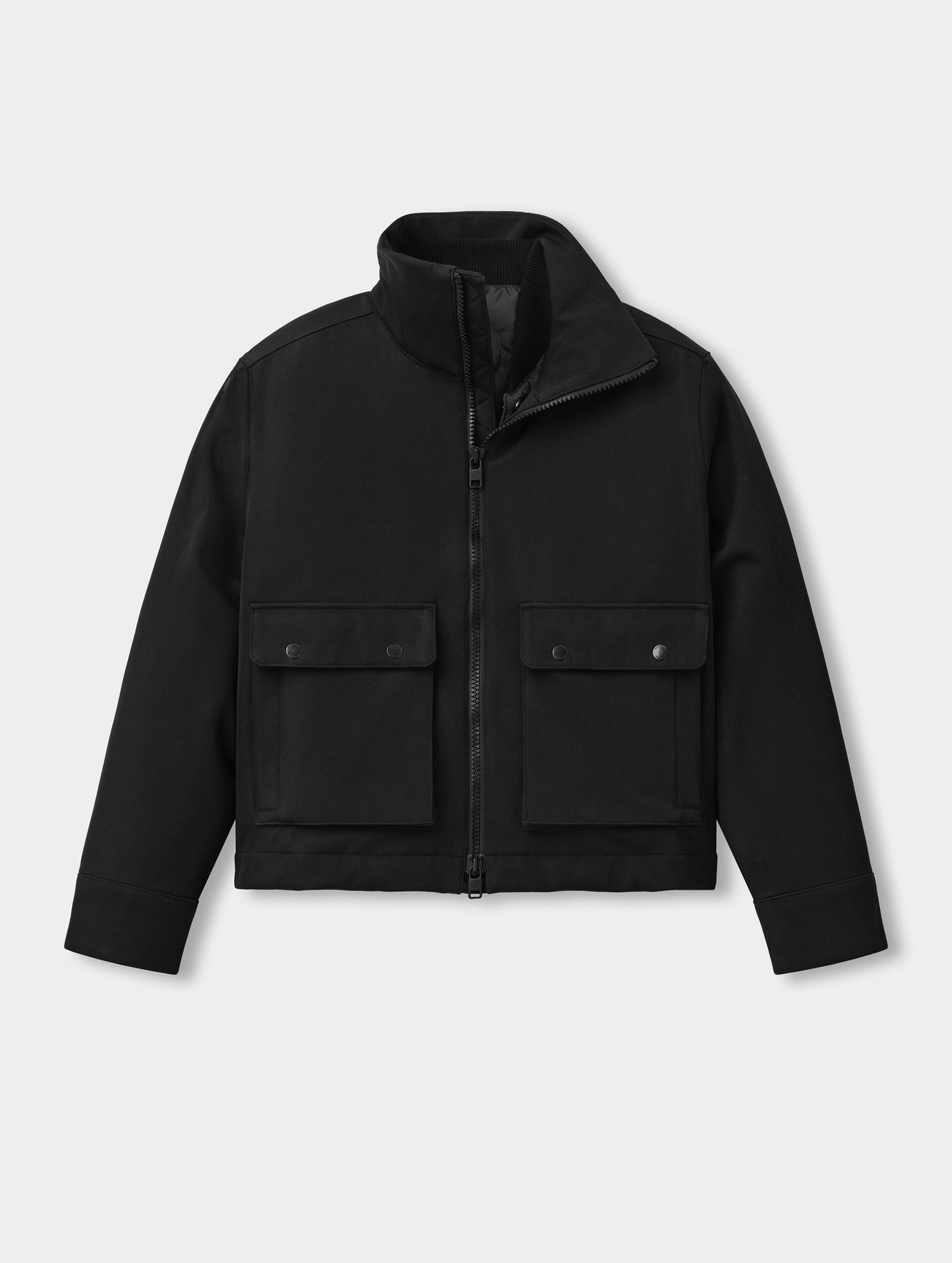 Flat lay view of the Luna 3-in-1 Field Jacket in Onyx Black from AETHER Apparel.
