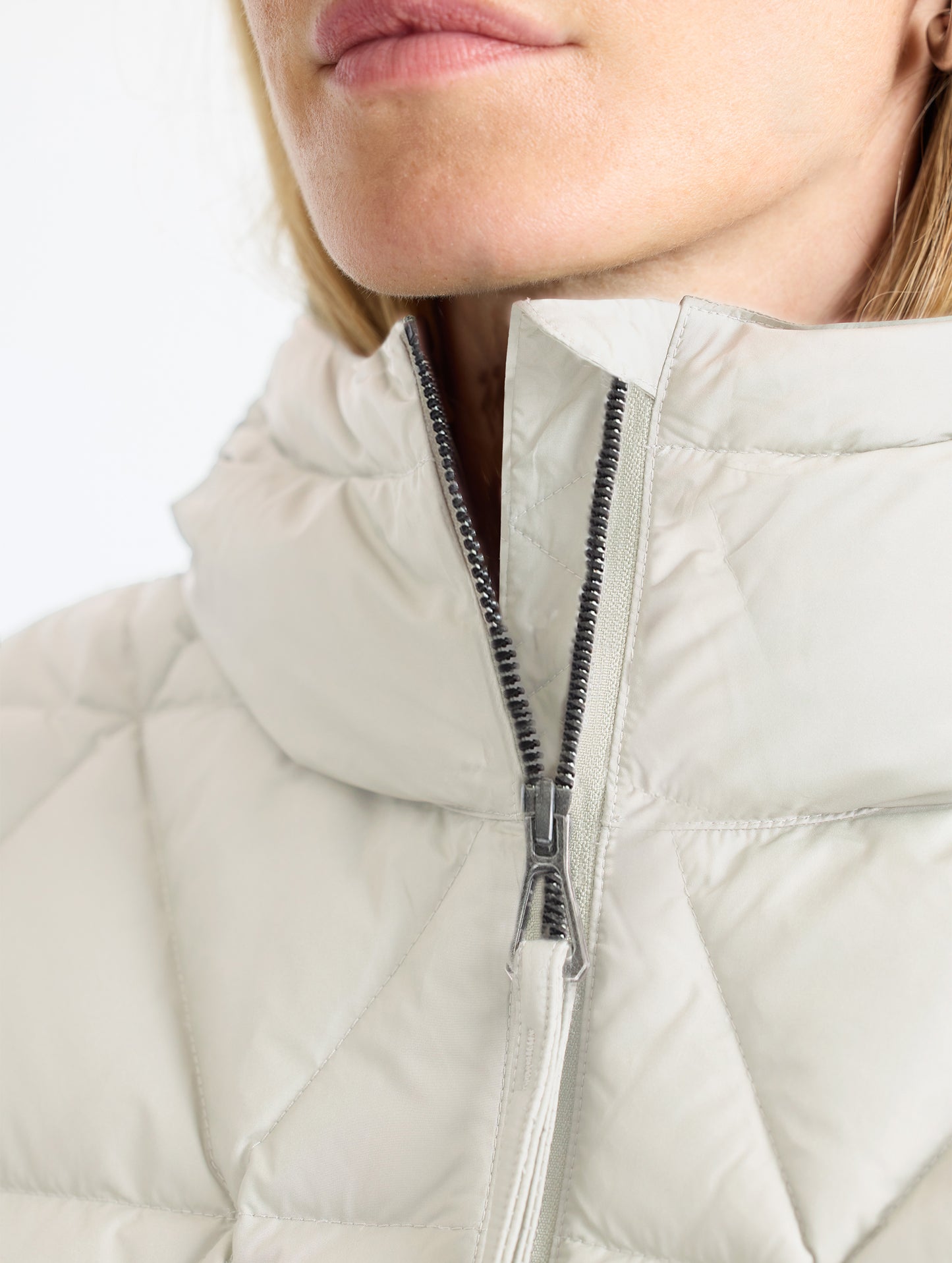 Closeup collar view of woman wearing Mailen Oversized Vest in Bone White from AETHER Apparel.