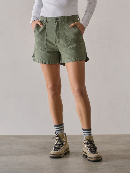 Front lower body view of woman wearing Masai Safari Short in Fern Green from AETHER Apparel.