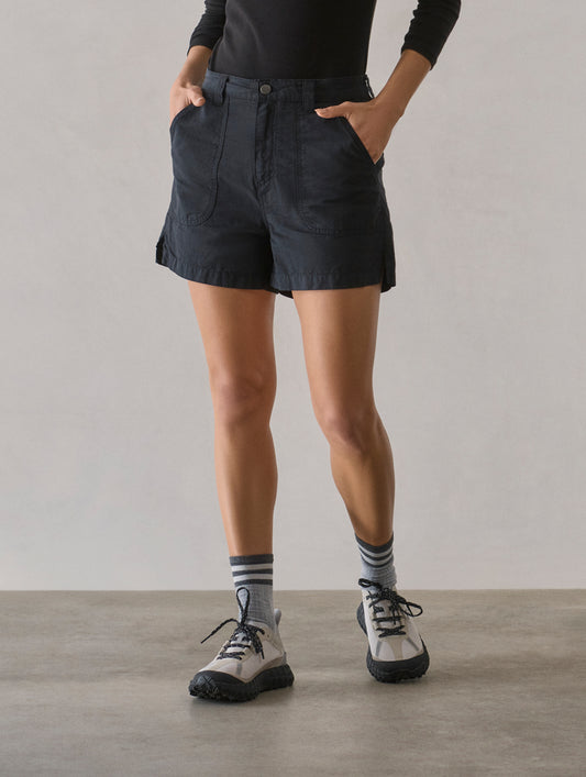 Front lower body view of woman wearing Masai Safari Short in Onyx Black from AETHER Apparel.