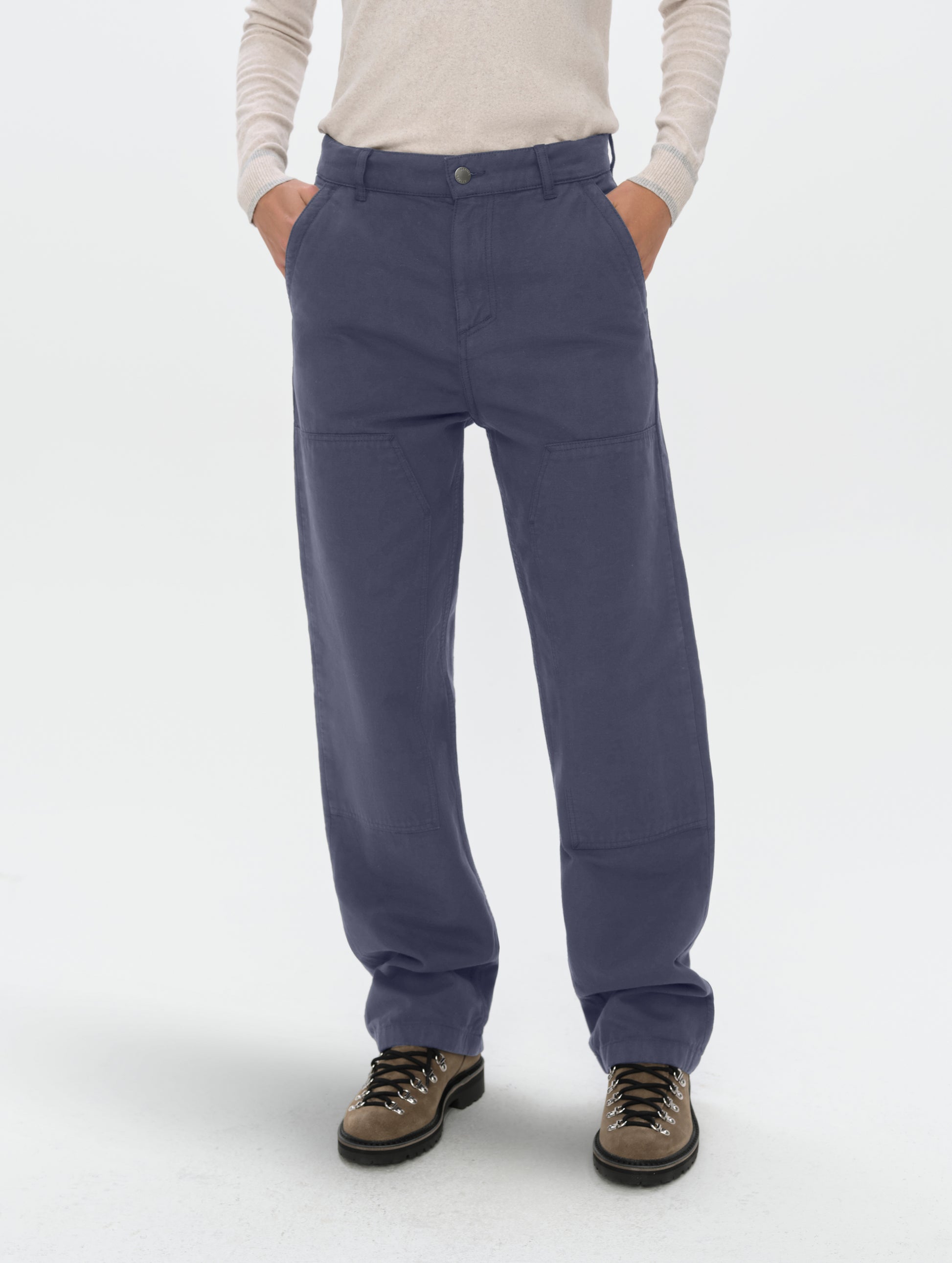 Front lower-body view of woman wearing the Natalie Utility Pant in Portal Blue from AETHER Apparel.
