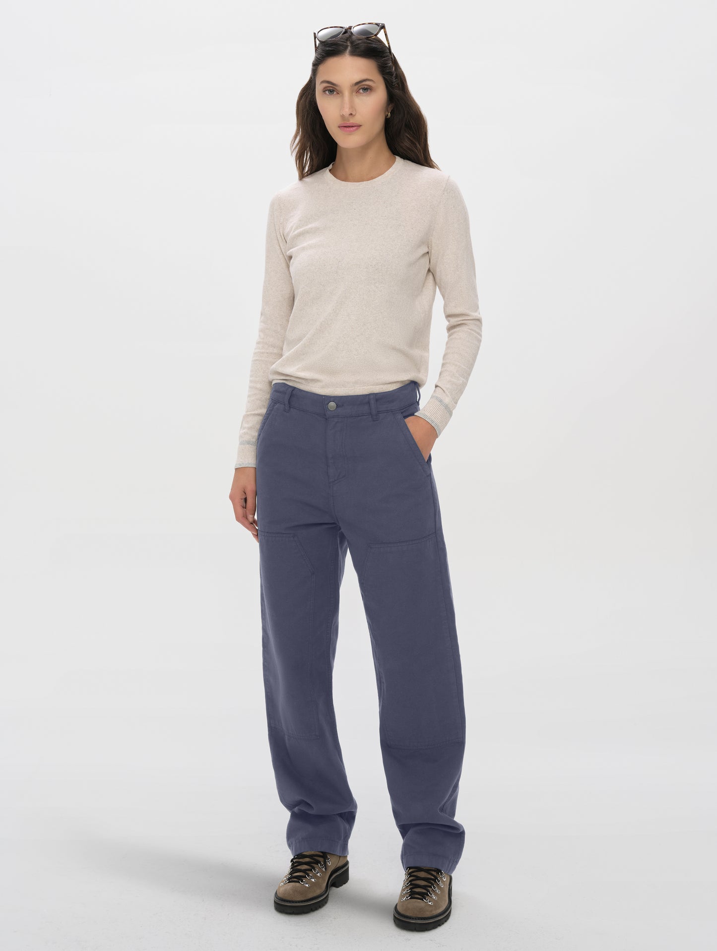 Front full-body view of woman wearing the Natalie Utility Pant in Portal Blue from AETHER Apparel.