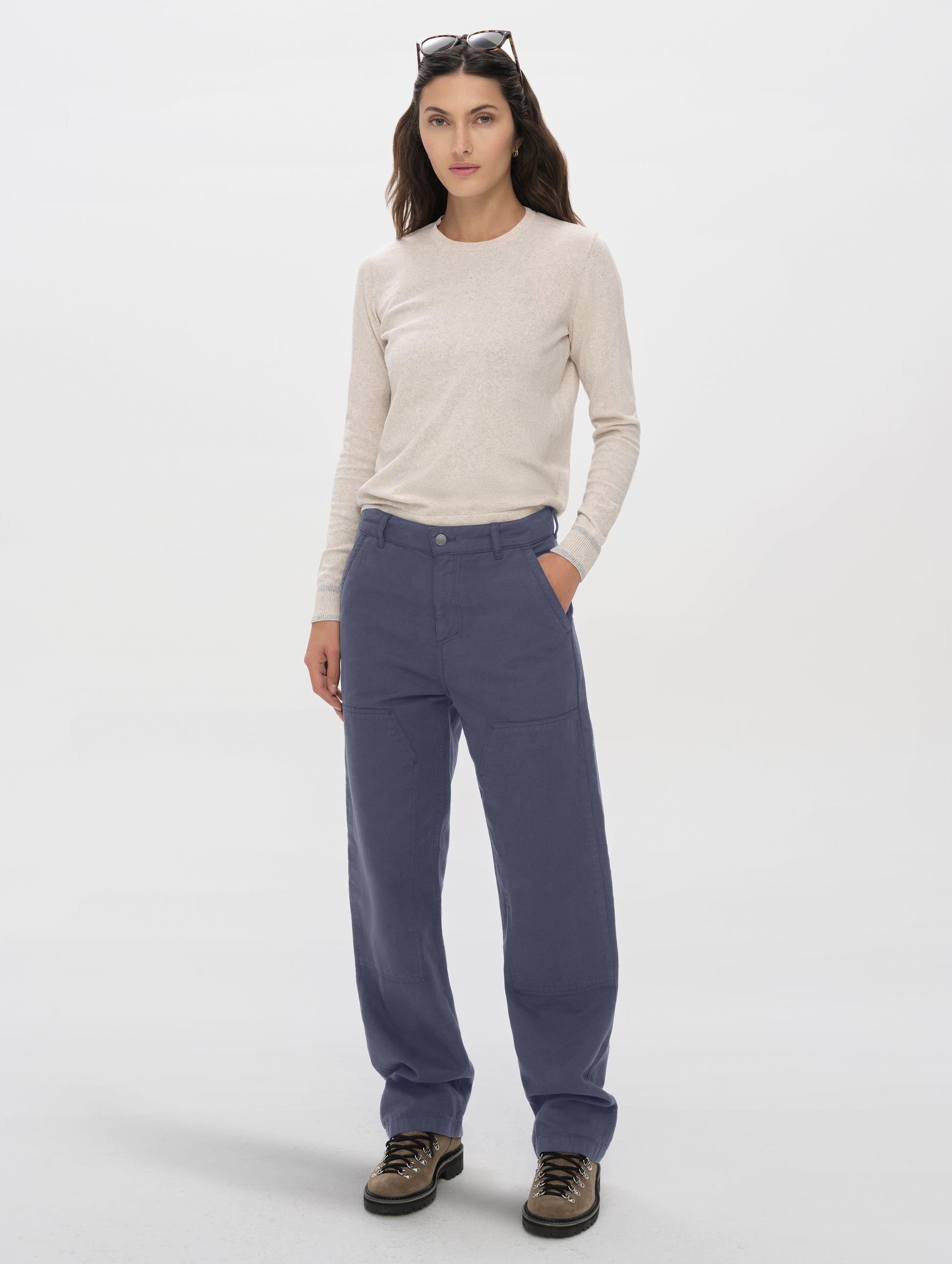 Front full-body view of woman wearing the Natalie Utility Pant in Portal Blue from AETHER Apparel.