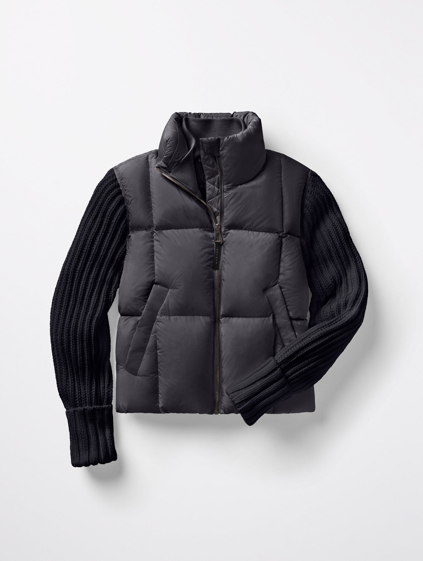 Flat lay of Nina Cardigan-Sleeve Jacket in Onyx Black from AETHER Apparel.