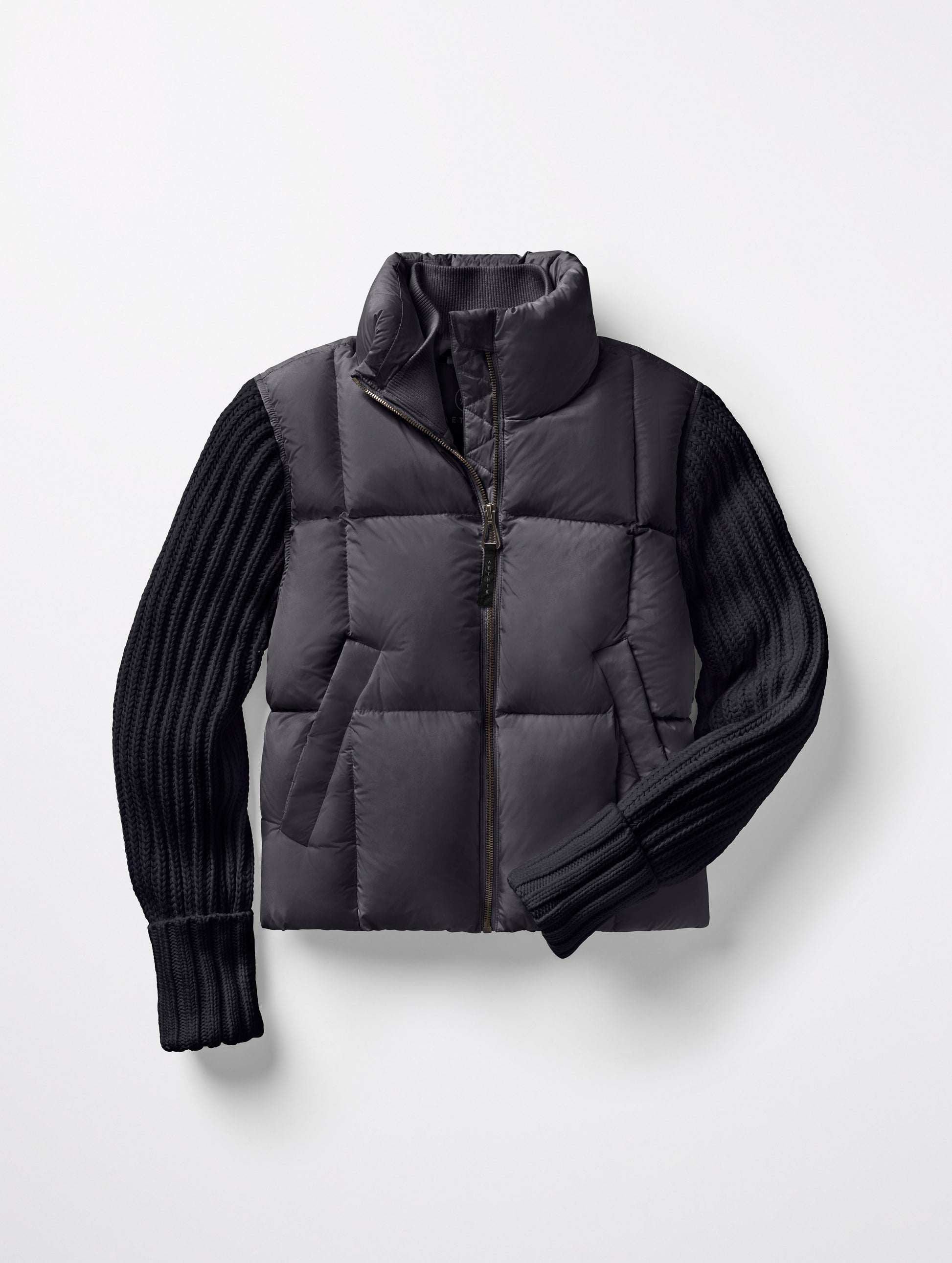 Flat lay of Nina Cardigan-Sleeve Jacket in Onyx Black from AETHER Apparel.
