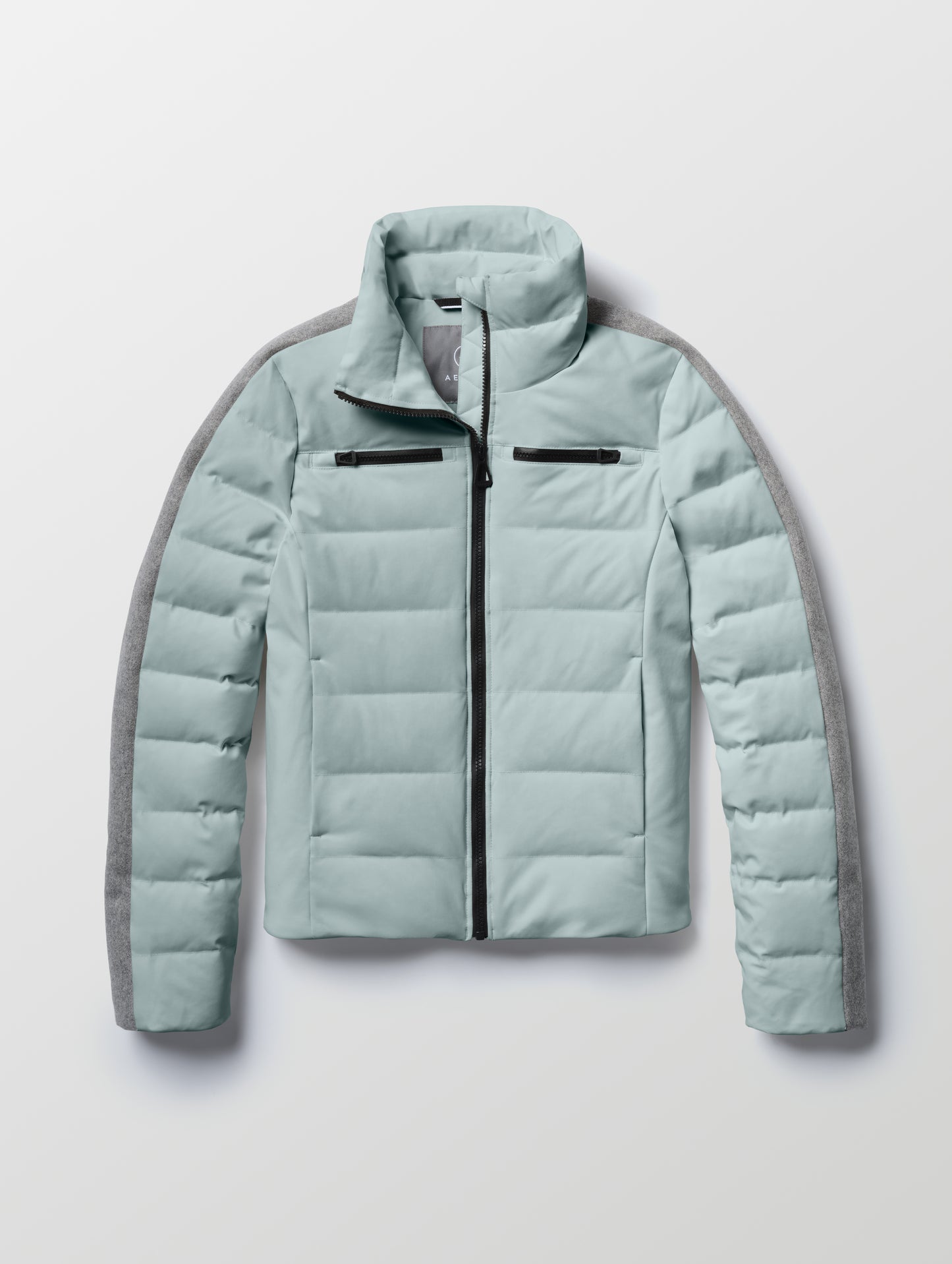 Flat lay of the Nordic Jacket 2.0 in Jadewood Green from AETHER Apparel. 
