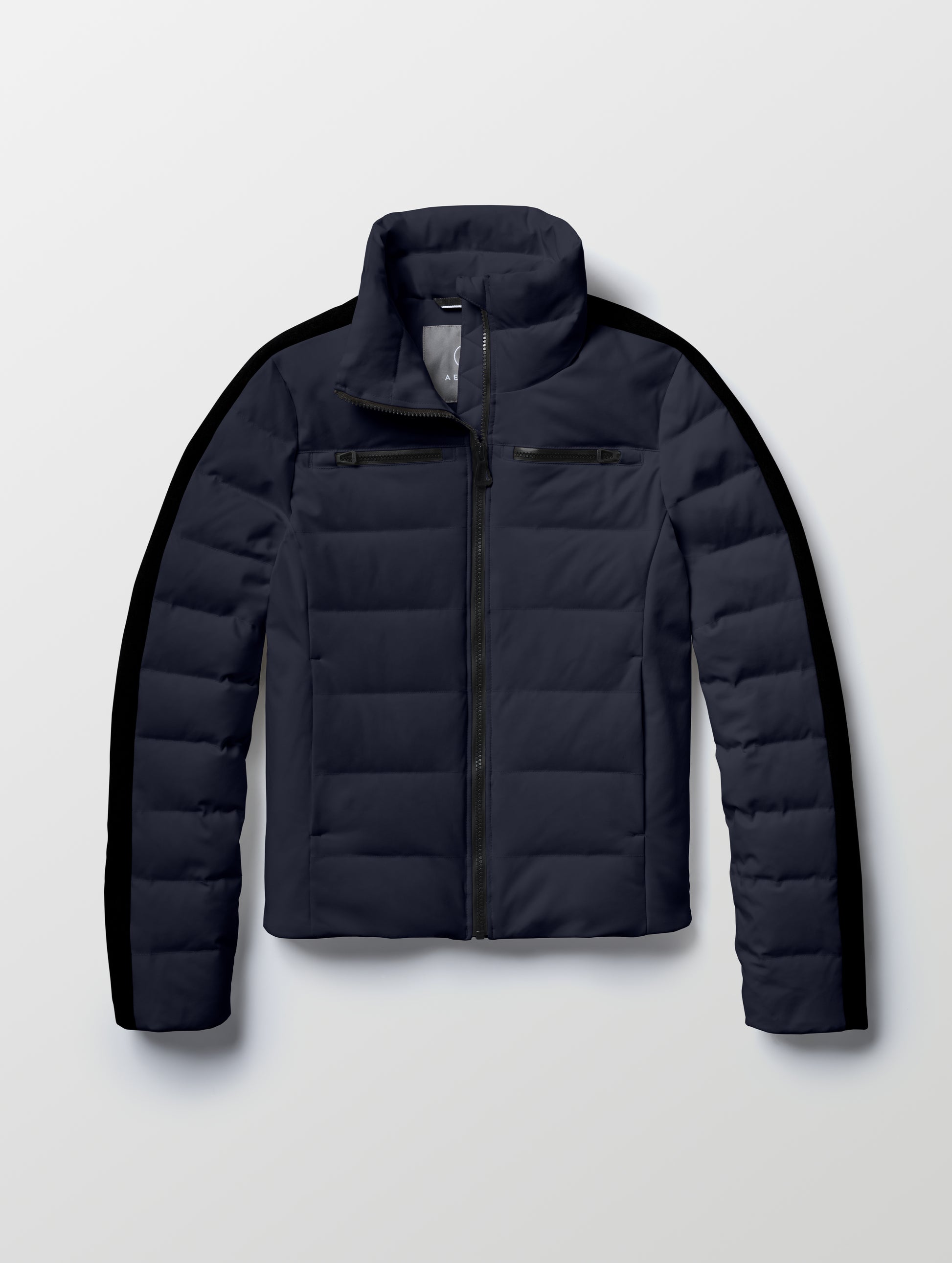 Flat lay of the Nordic Jacket 2.0 in Total Eclipse dark blue from AETHER Apparel.