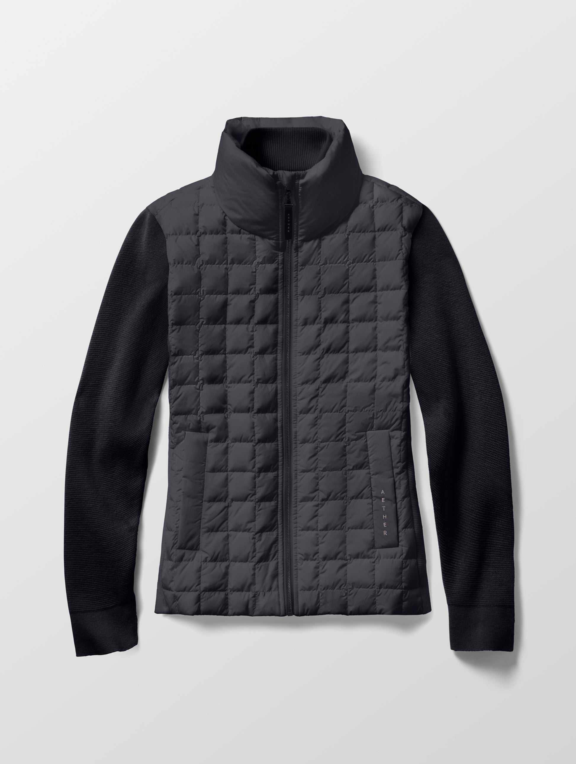 Flat lay of the Phase Full-Zip in Onyx Black from AETHER Apparel.