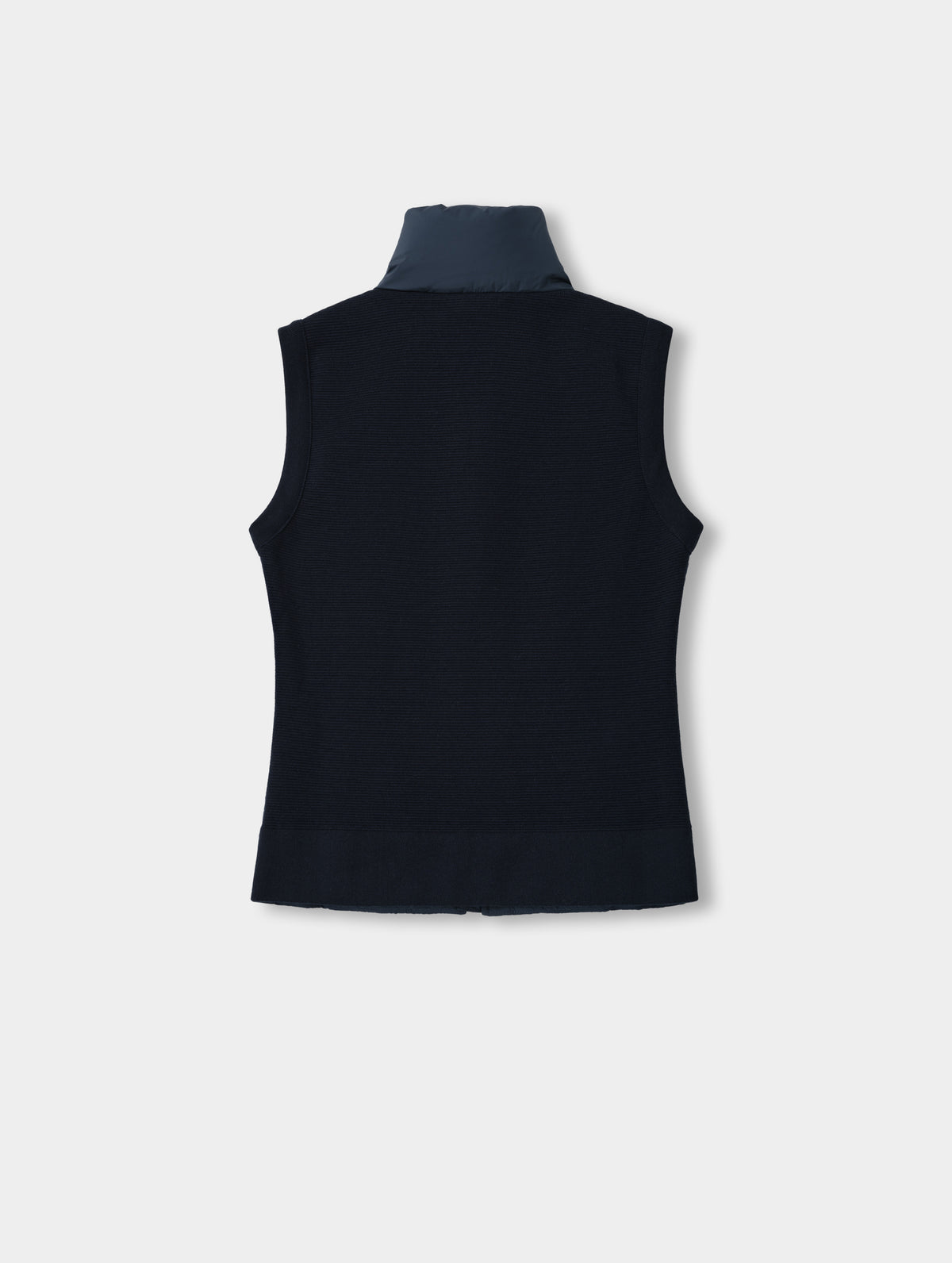 Flat lay view of the back of the Phase Vest in Total Eclipse from AETHER Apparel.