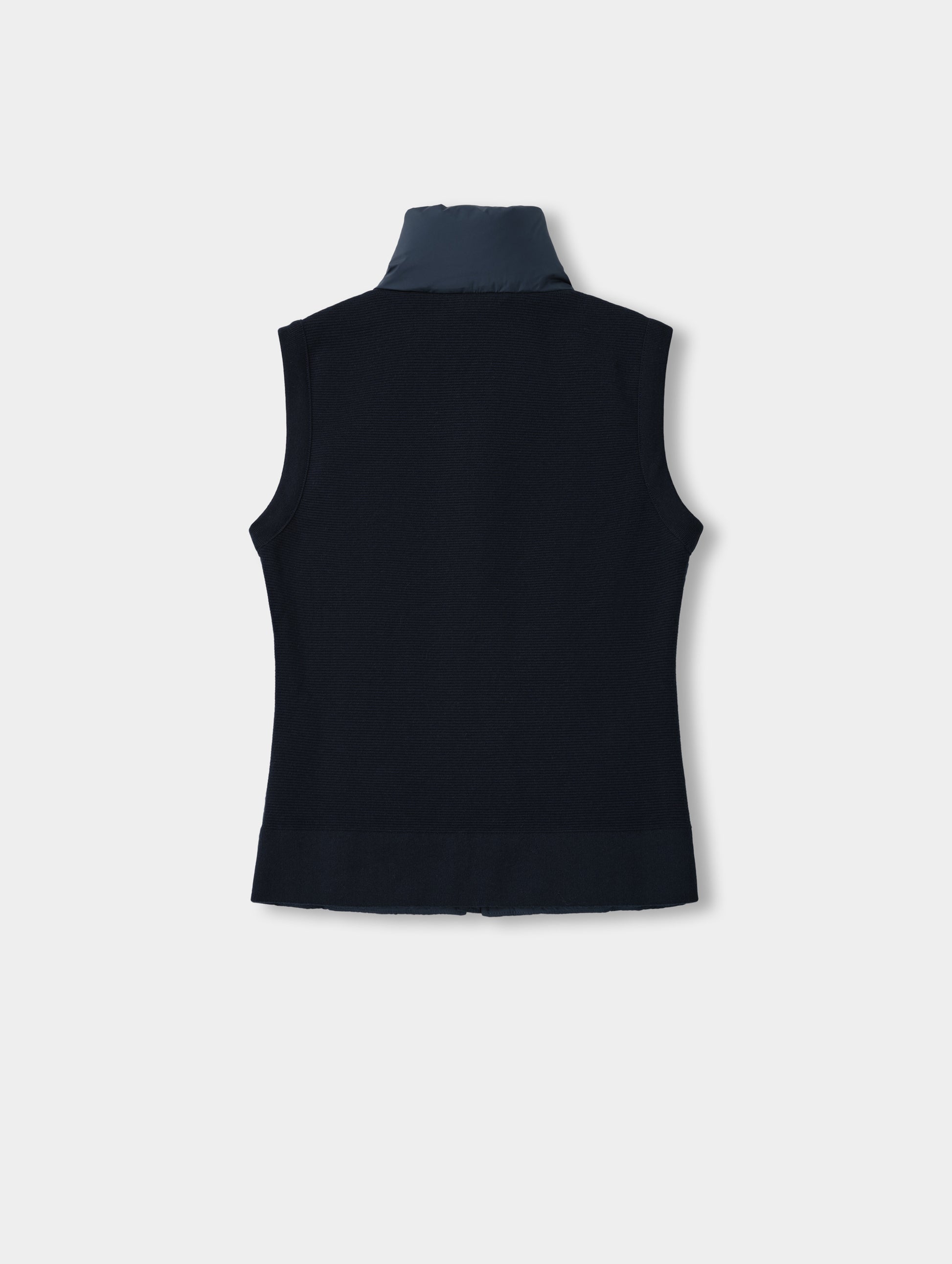 Flat lay view of the back of the Phase Vest in Total Eclipse from AETHER Apparel.